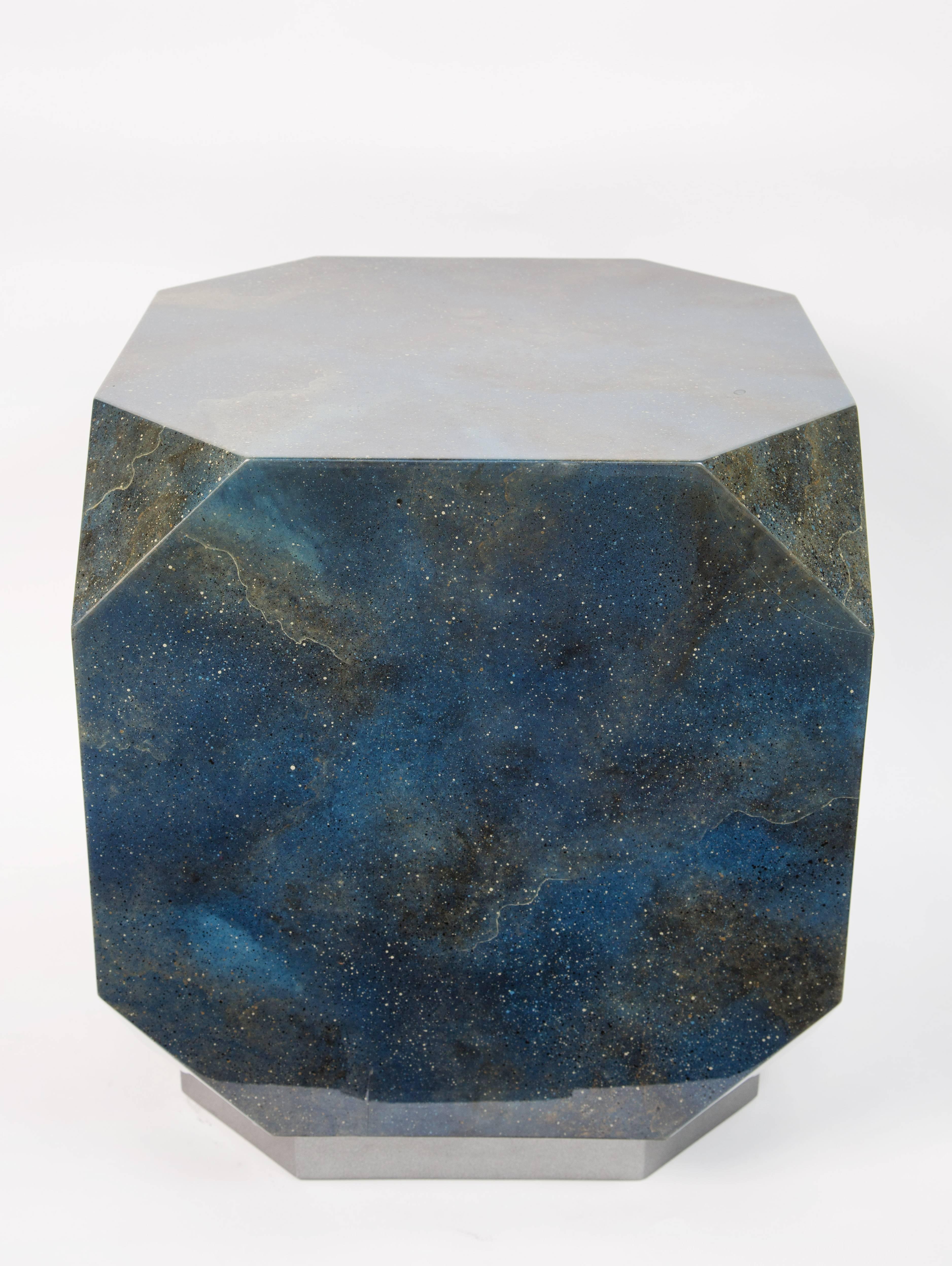 Geometric, faceted resin side table resembling lapis lazuli on brushed metal base, 1980s.