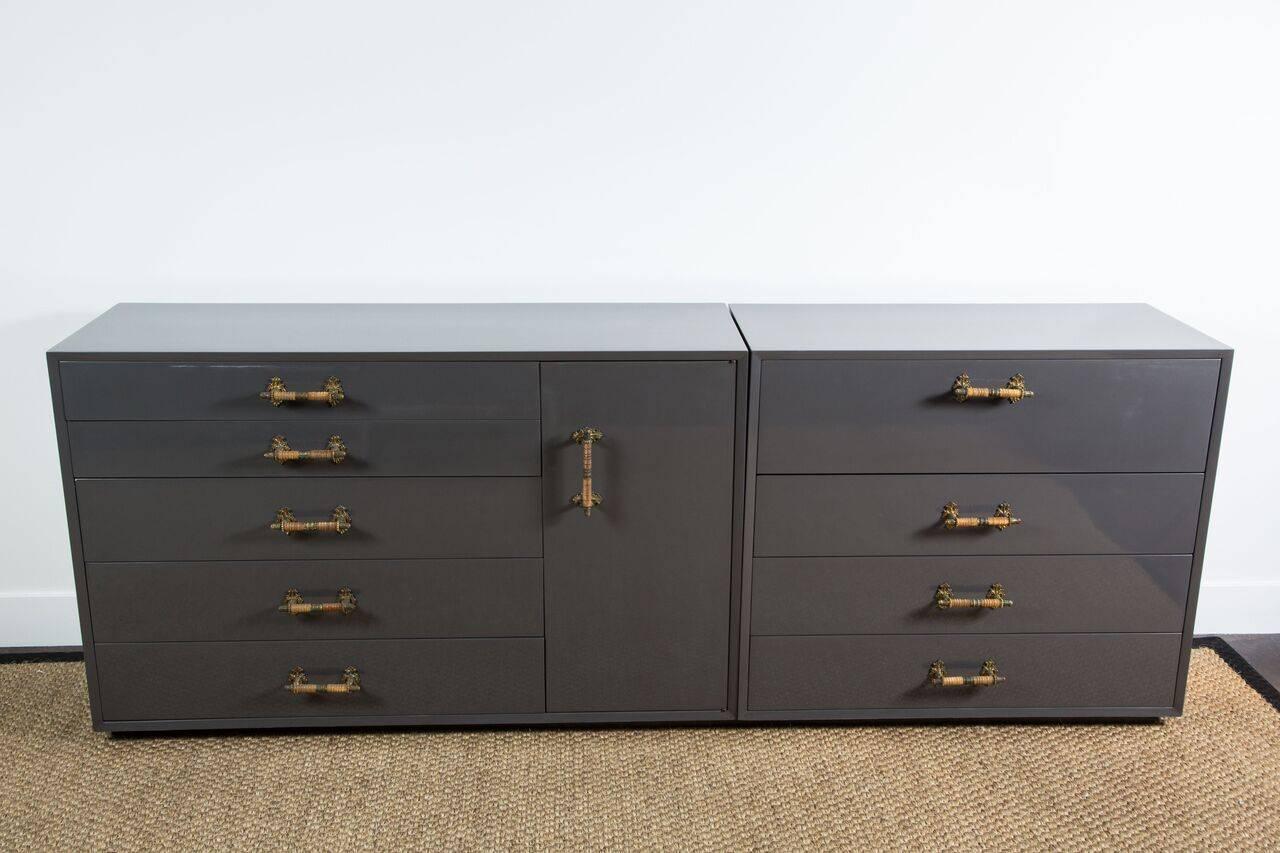 Masculine yet glamorous pair of gentleman's chests newly lacquered in warm gray. One chest features a drawer that opens to reveal a desk which has been newly lacquered in a stunning blue. Original hardware.

  