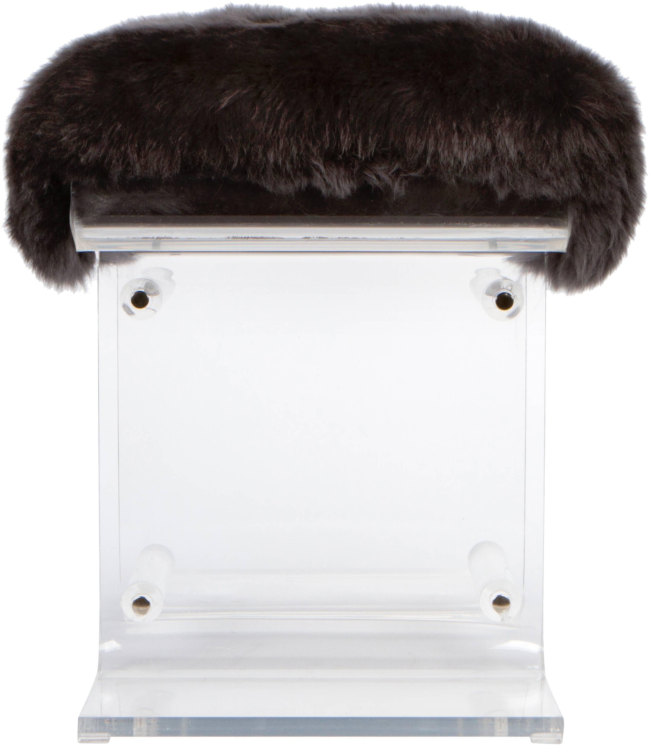Glamorous lucite bench, circa 1980s. Newly upholstered in a charcoal grey fur.