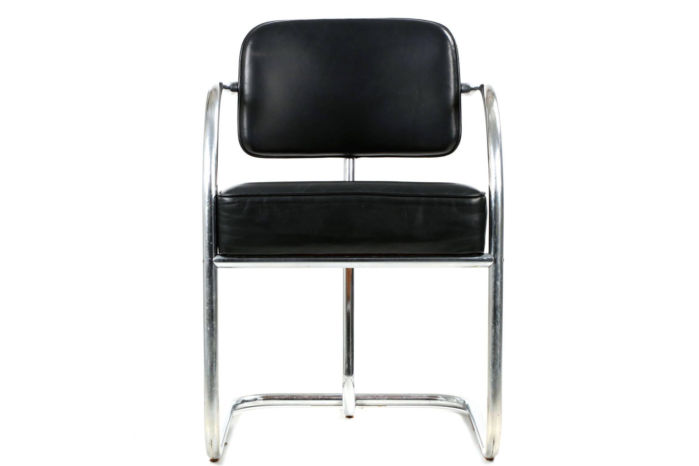 An original interpretation of the cantilever chair, this gorgeous chromed steel tubular chair is a striking display of unending curvature, the arms in the classic C-form, the back supported by an angled brace that mirrors the curvature of the front