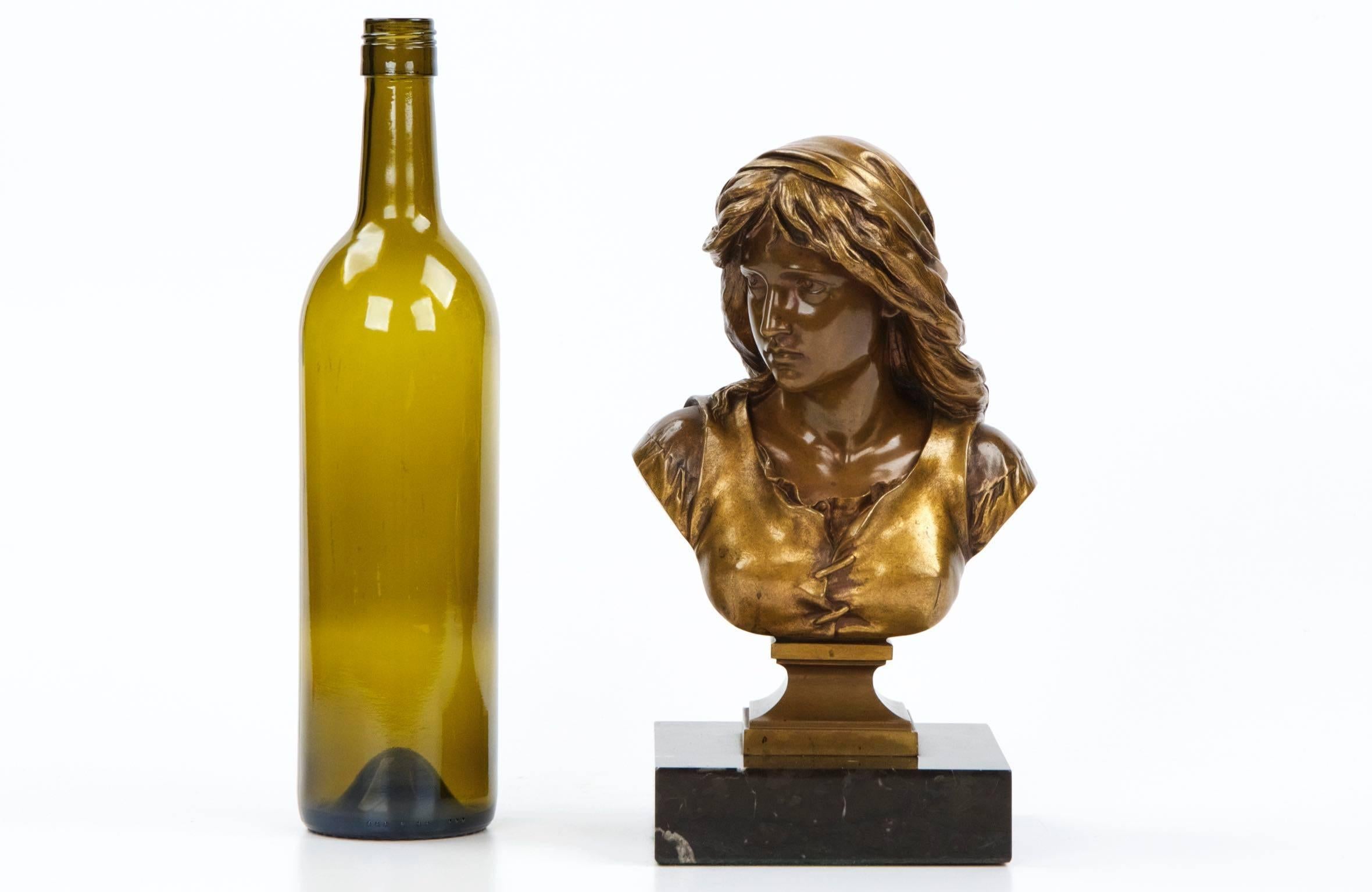 A Barbedienne bronze bust of mignon after Eugene Aizelin (French, 1821-1902).
Signed on shoulders “F. Barbedienne Fondeur Paris 575” “E. Aizelin” with “A. Collas” reduction seal.

An inordinately fine casting of Mignon by the foundry of Ferdinand
