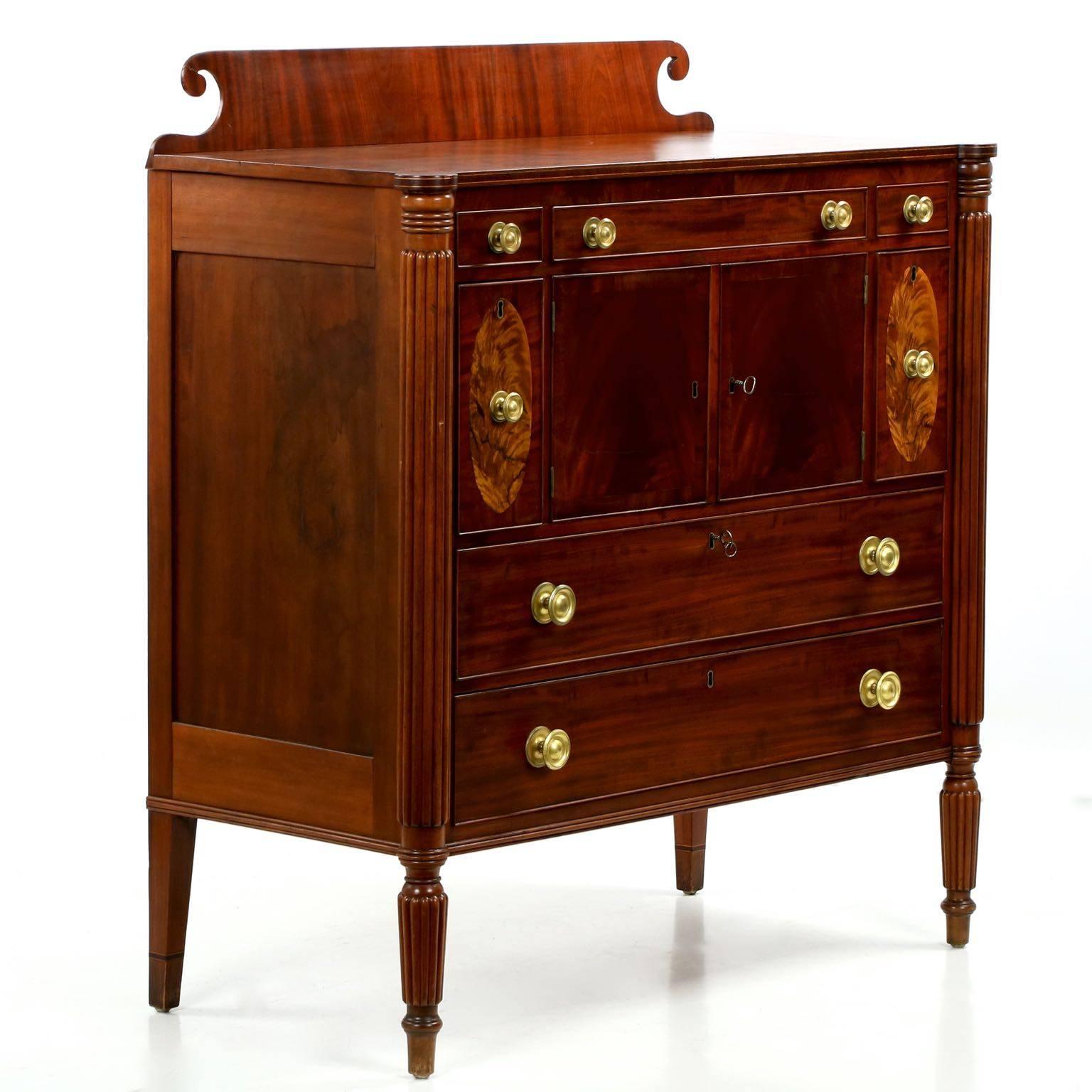 A work of highly precise and imaginative craftsmanship, the casework on this chest of drawers is simply outstanding, the underside of the case shows large dovetails locking tenon-mortised frame of the sides into the bottom while large fore-aft