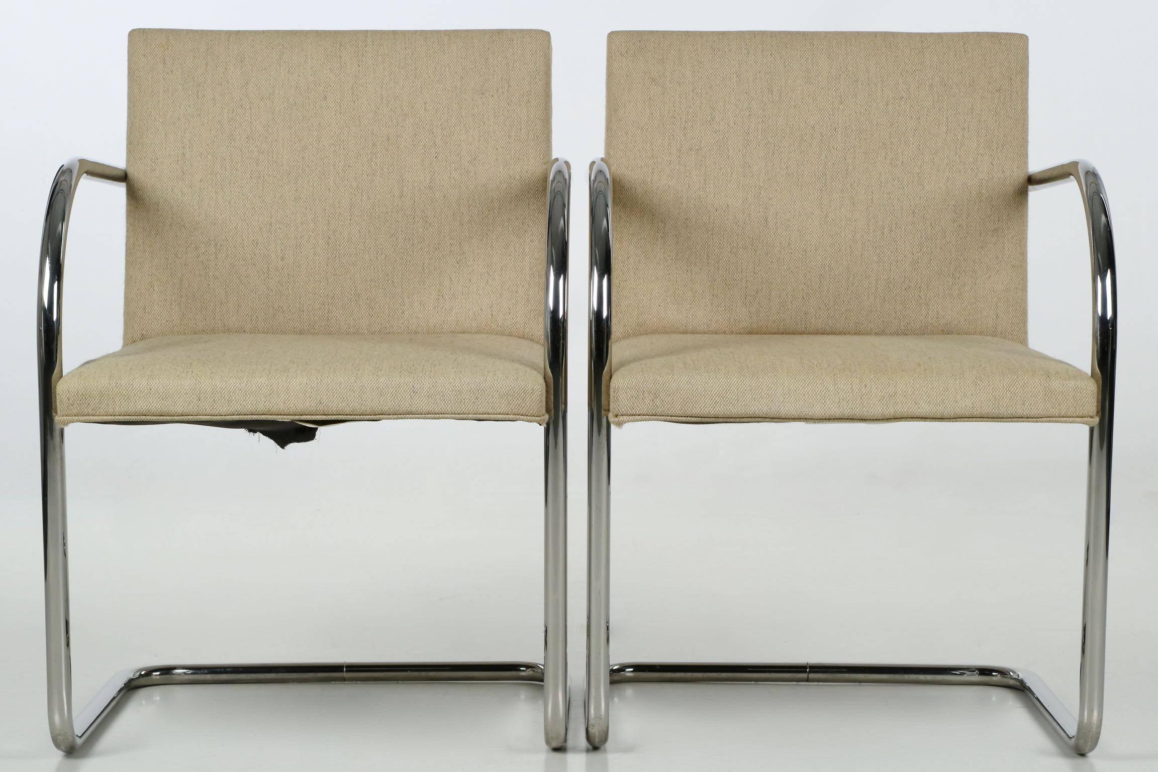 This gorgeous set of six Knoll International, Inc. chrome tubular steel cantilever dining chairs have long achieved iconic status, the brainchild of Ludwig Mies van der Rohe and a form that has remained highly desirable since they were introduced in