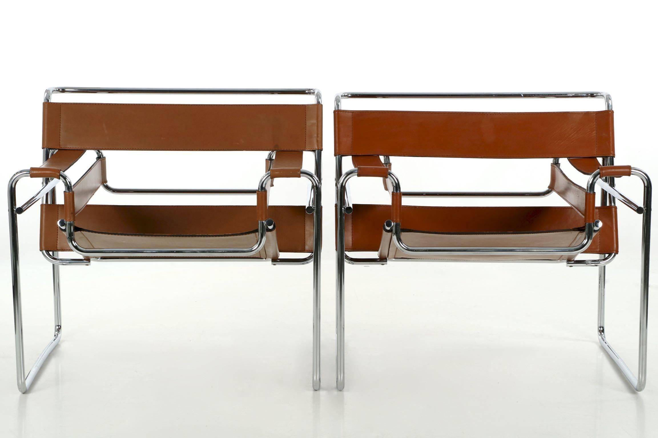 This gorgeous pair of tubular steel lounge chairs are of a remarkably high quality, after the original iconic chair by Marcel Breuer. They have been held in a single collection since the original owner purchased them from Knoll Studio in 1980. The