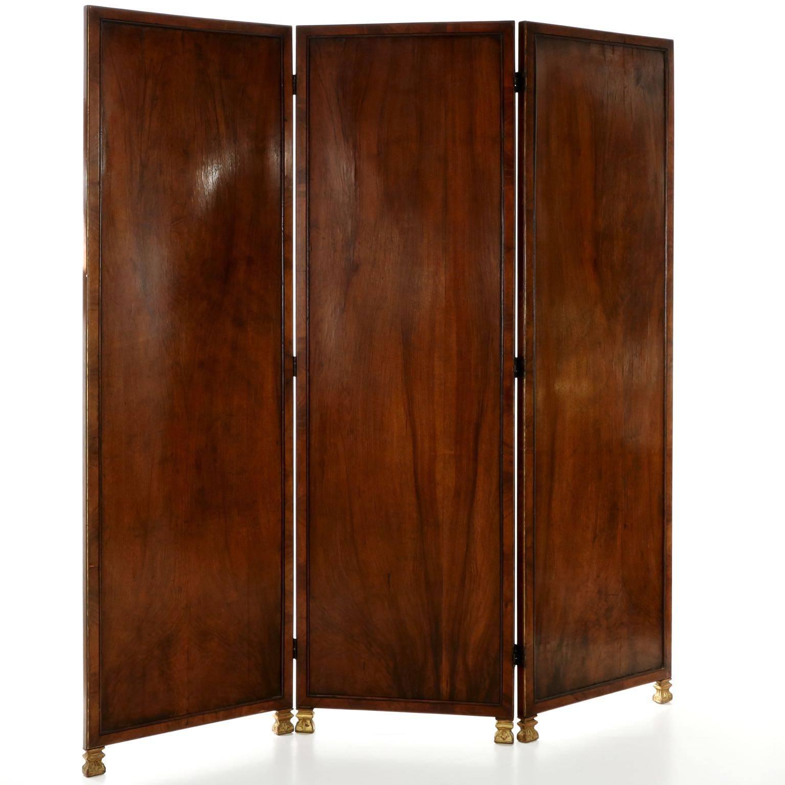 An unusual piece of very nice craftsmanship throughout, this room divider was designed in the English Regency taste, probably circa the last quarter of the 19th century. One side is rough and natural with the early woven burlap juxtaposed against