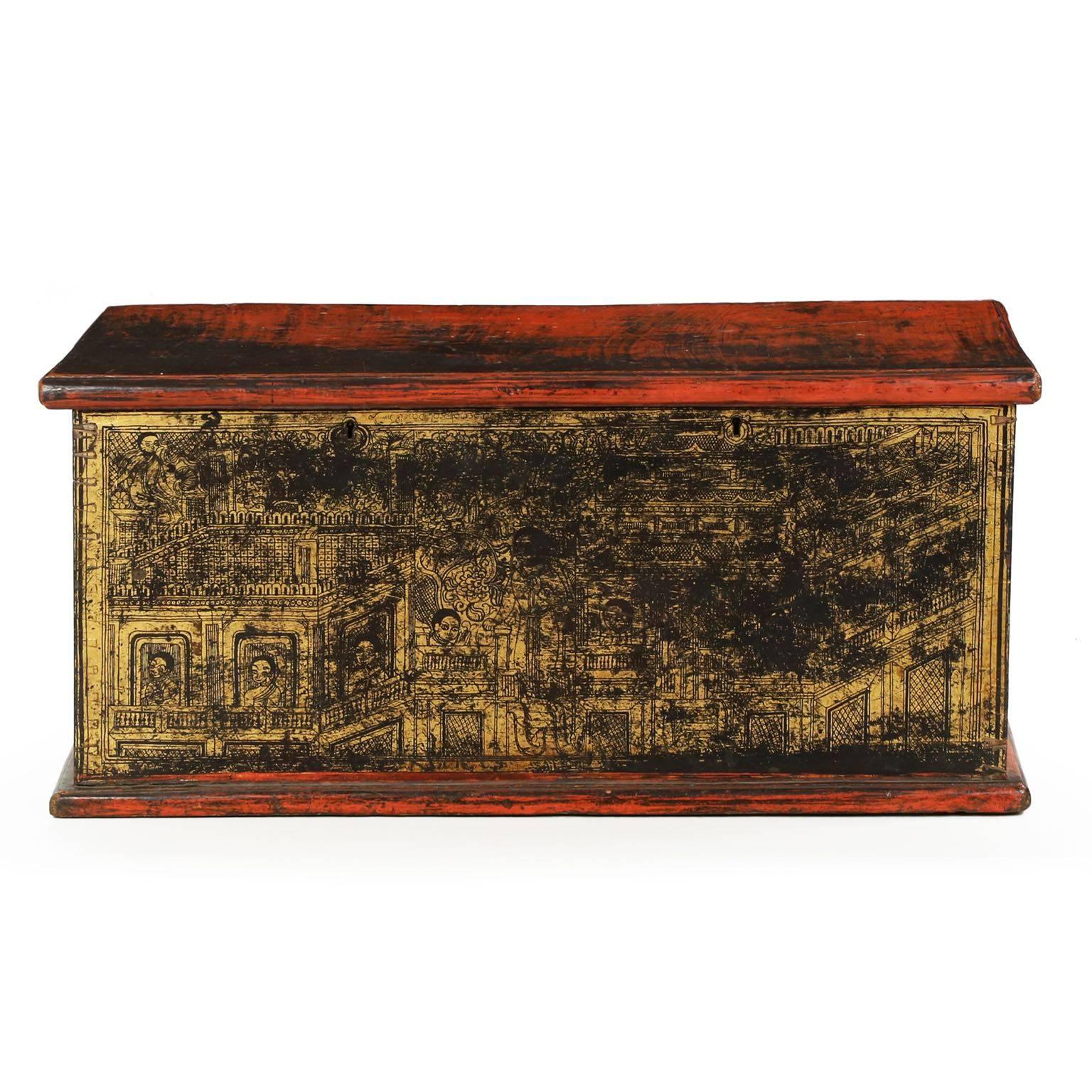 A very well preserved chest from the mid-to-late 19th century, the case is inordinately heavy with large open dovetails securing each corner of the chest beneath a red bole and the painted surface. Rather detailed, the ebonized ground is intricately
