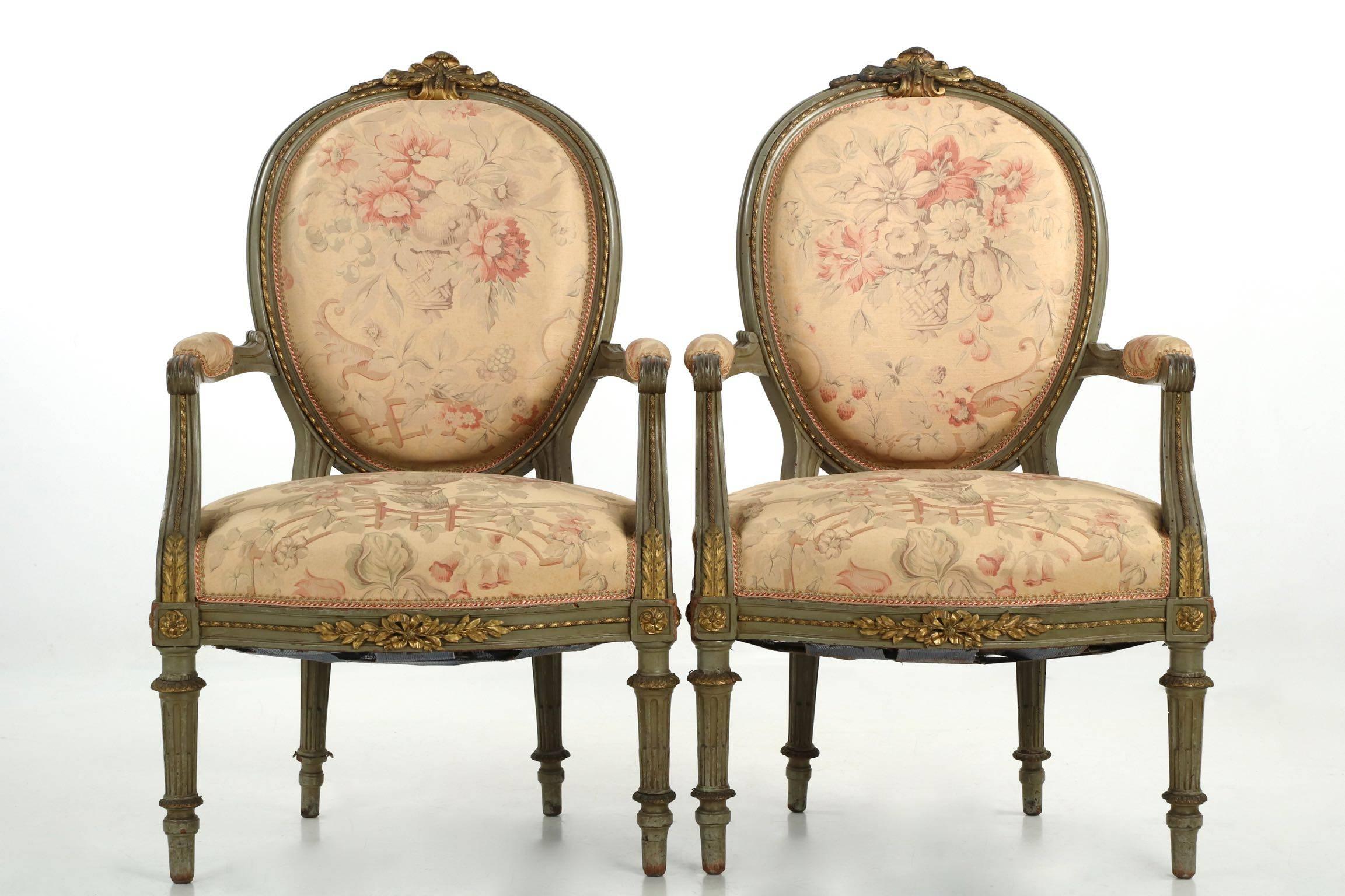 A quite nice Louis XVI style salon suite with what appears to be it’s original polychromed green surface, the chairs are extensively embellished with beautiful gilt metal mounts in the Napoleon III taste. Several chair crest mounts have old foundry