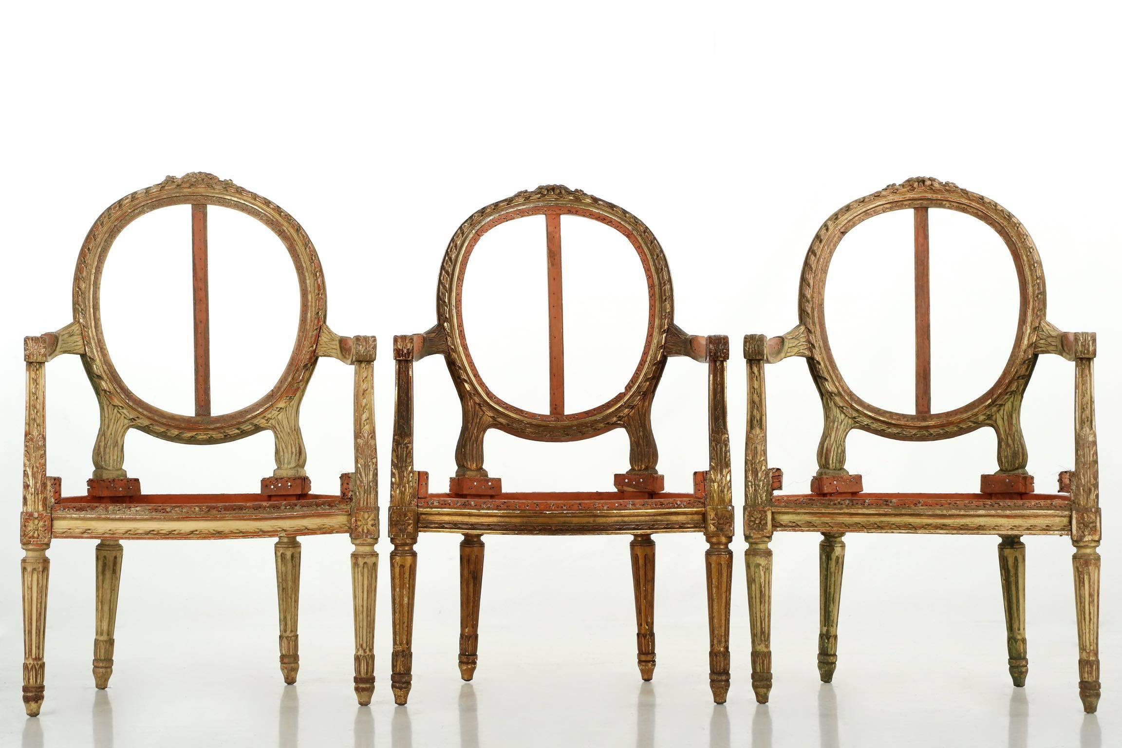 European French Louis XVI Distressed Painted Salon Suite of Settee with Three Armchairs