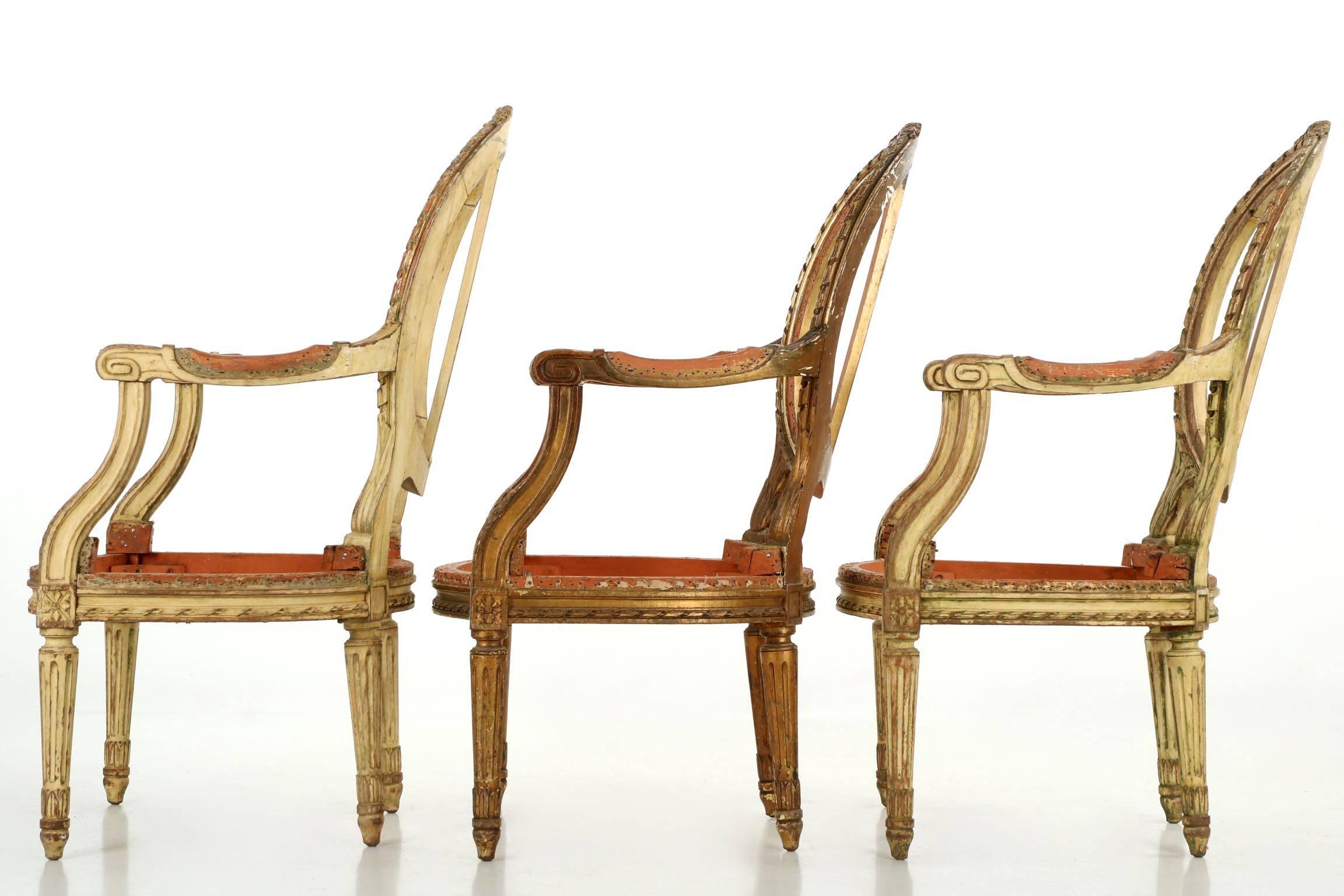 Carved French Louis XVI Distressed Painted Salon Suite of Settee with Three Armchairs