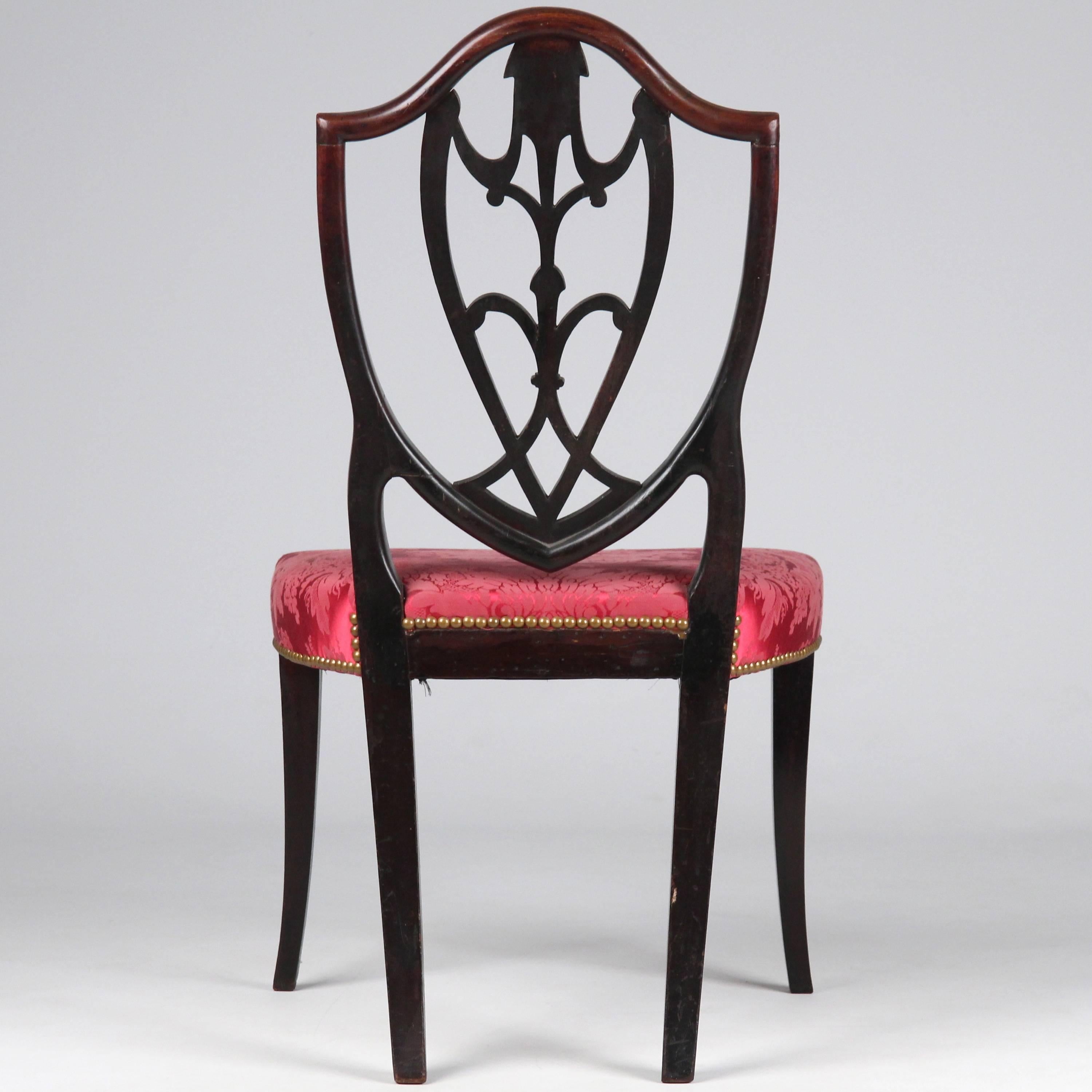 Exhibiting the finest lines and perfect sense of proportion to be found in any form of the period, this rare and incredibly beautiful chair is a work of art in it's purest expression. Flawless balance of proportions is clearly calculated in each