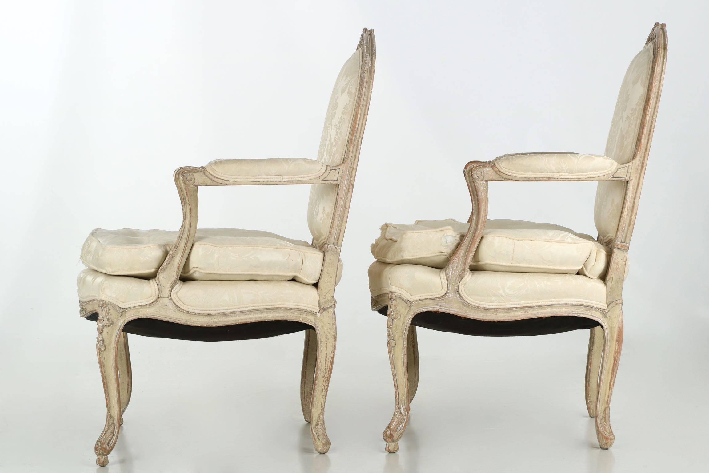 A quite attractive pair of vintage fauteuils probably crafted in the 1940s, they exhibit all of the carvings of the Louis XV period executed in relief along the crest and throughout the apron. The proportions are most comfortable and when they are