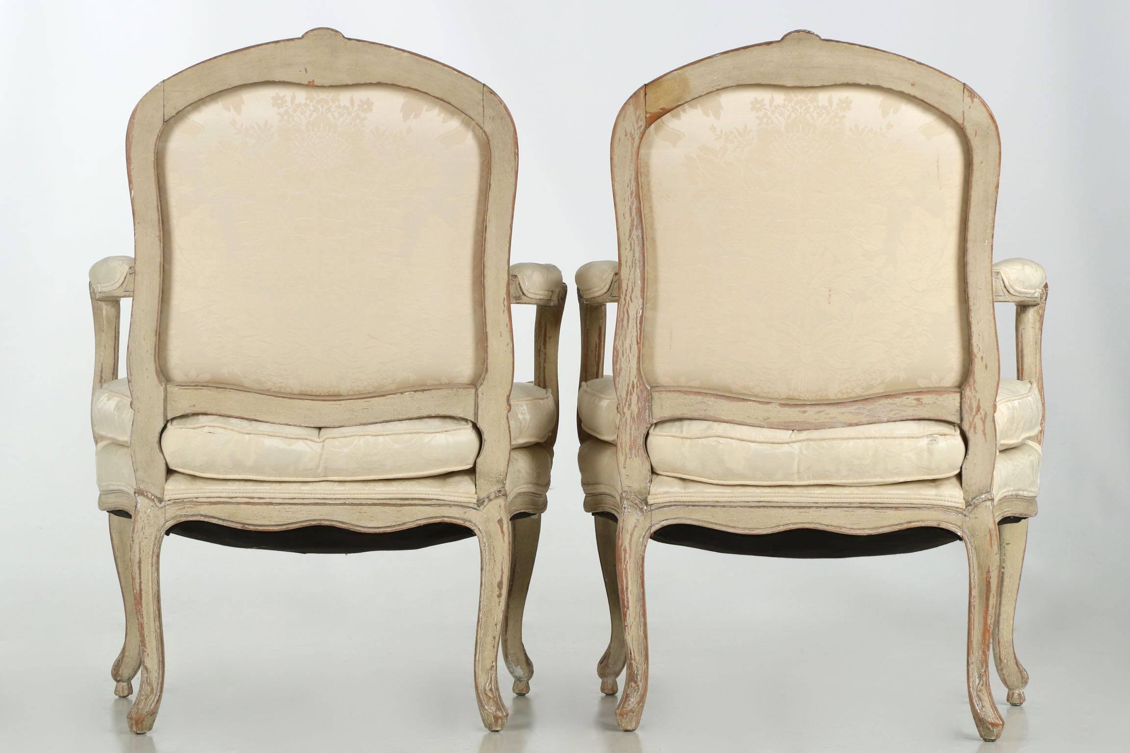 European Vintage Pair of French Louis XV Style Distressed White Painted Armchairs