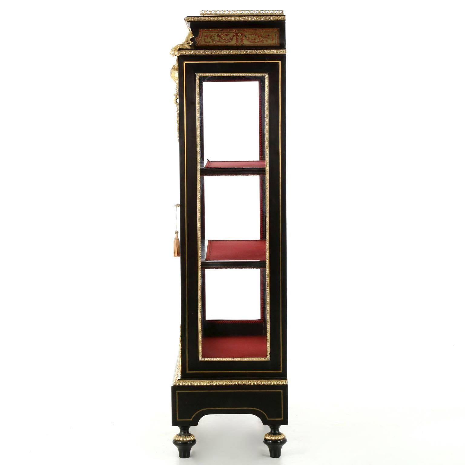 This 20th century reproduction is a perfect expression of the Napoleon III taste, exquisitely constructed with the finest materials for a powerful presentation. The deep and pure ebony surface is contrasted with brilliant displays of ormolu that