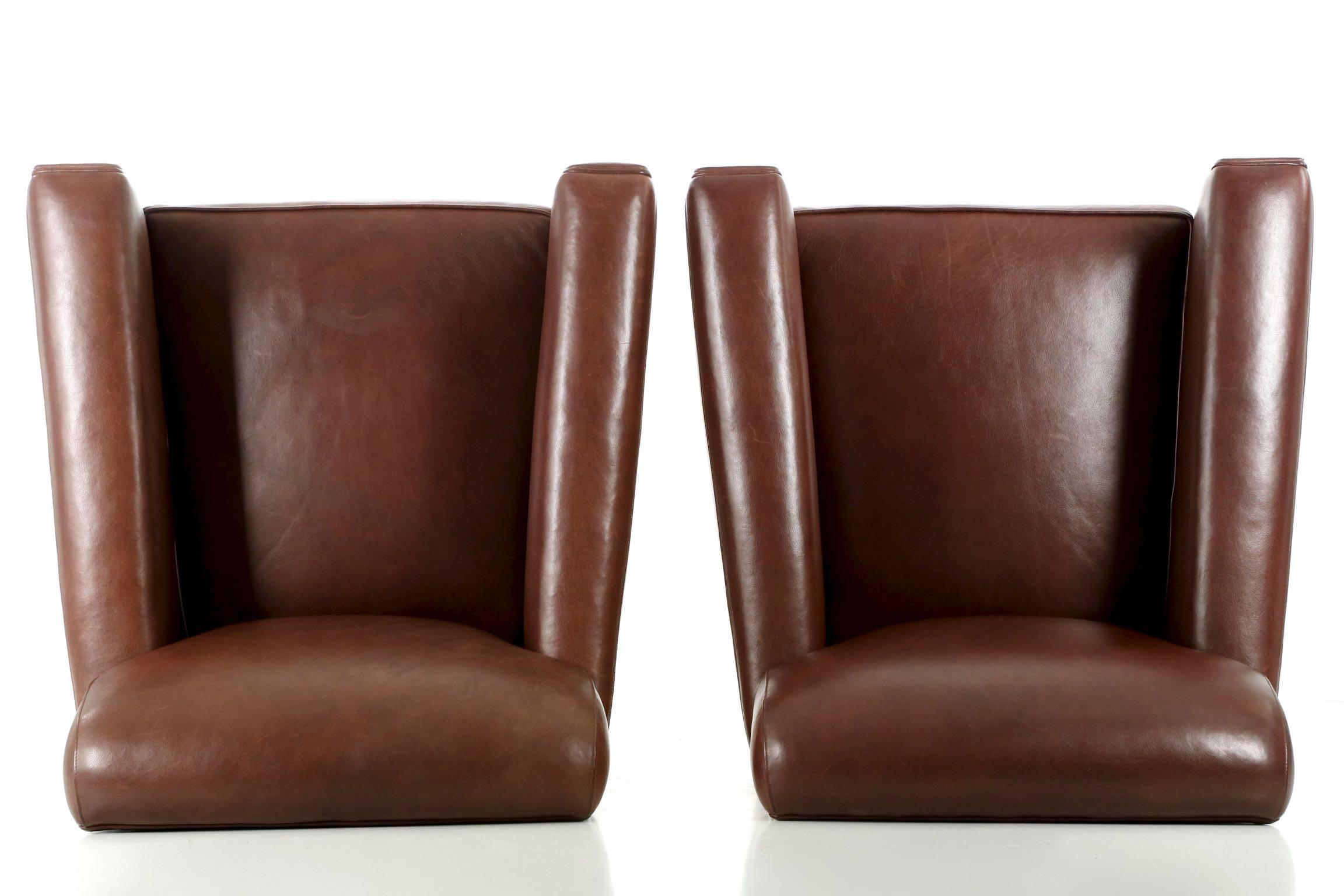 American Pair of Coach Inc. Brown Leather Club Chairs in the Art Deco Taste