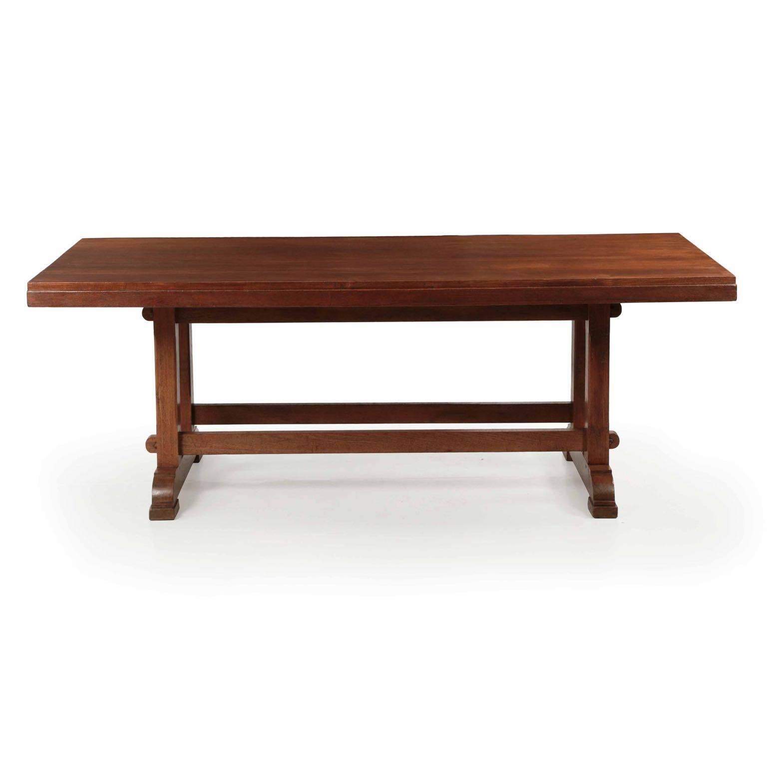This gorgeous teak trestle table has developed a most attractive patina in it’s surface from years of gentle use and regular waxing. The result is a nice variation with a touch of oxidization under the silky touch of burnished waxes that leaves a