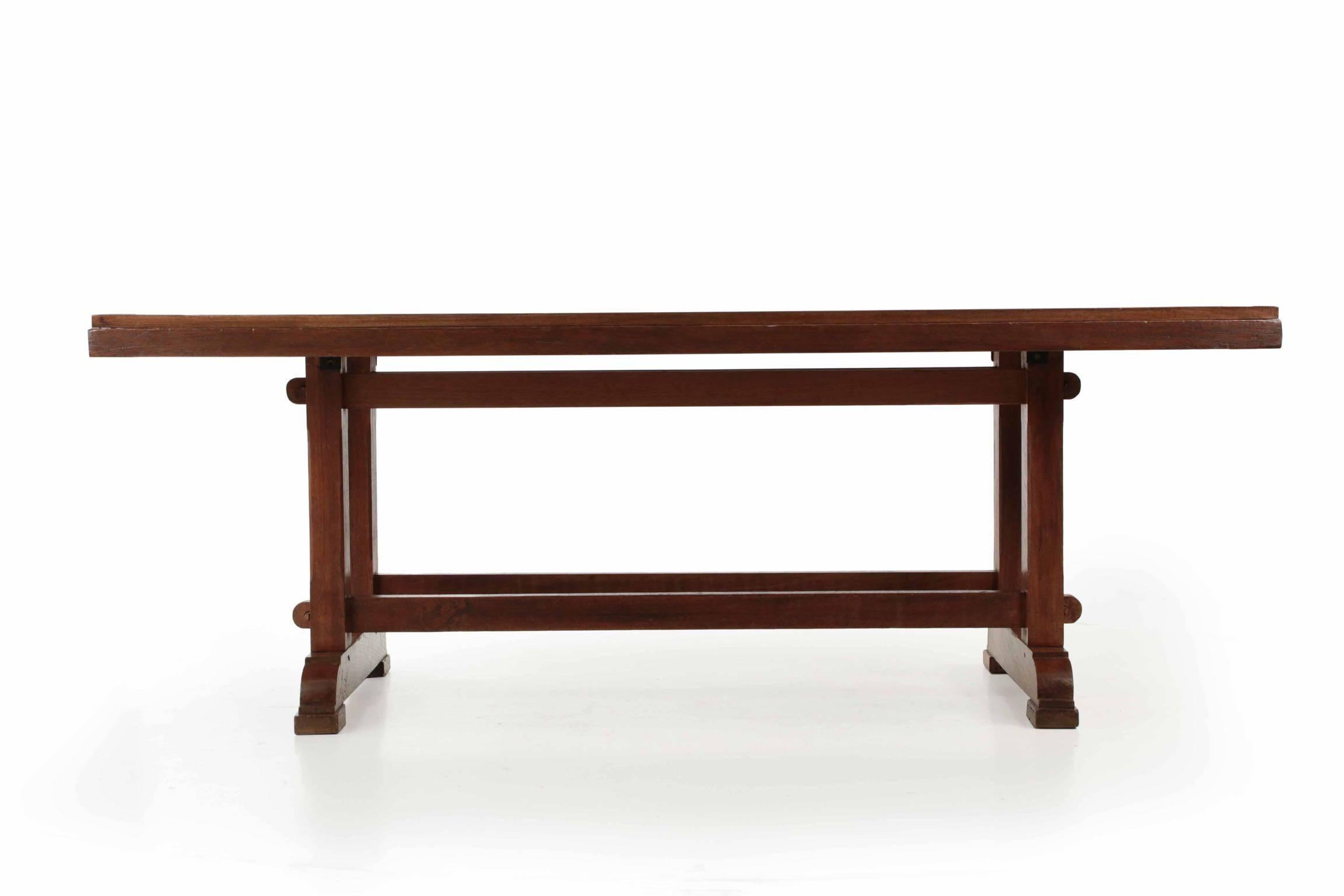 Wood English Arts & Crafts Teak Trestle Dining Table, circa 1930