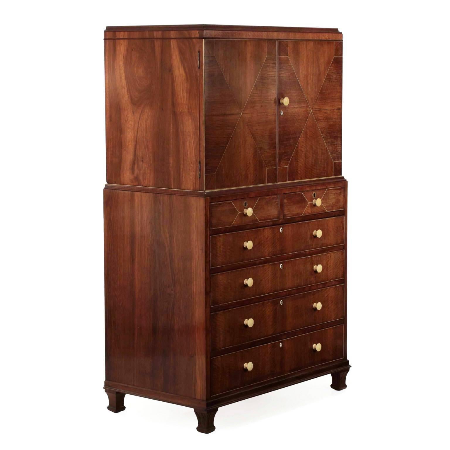 This finely crafted Deco period chiffonier is an interesting intersection of angular simplicity against the rich materials with only light surface embellishment. The primary surfaces are veneered with a wonderful mellowed rosewood; the exotic wood