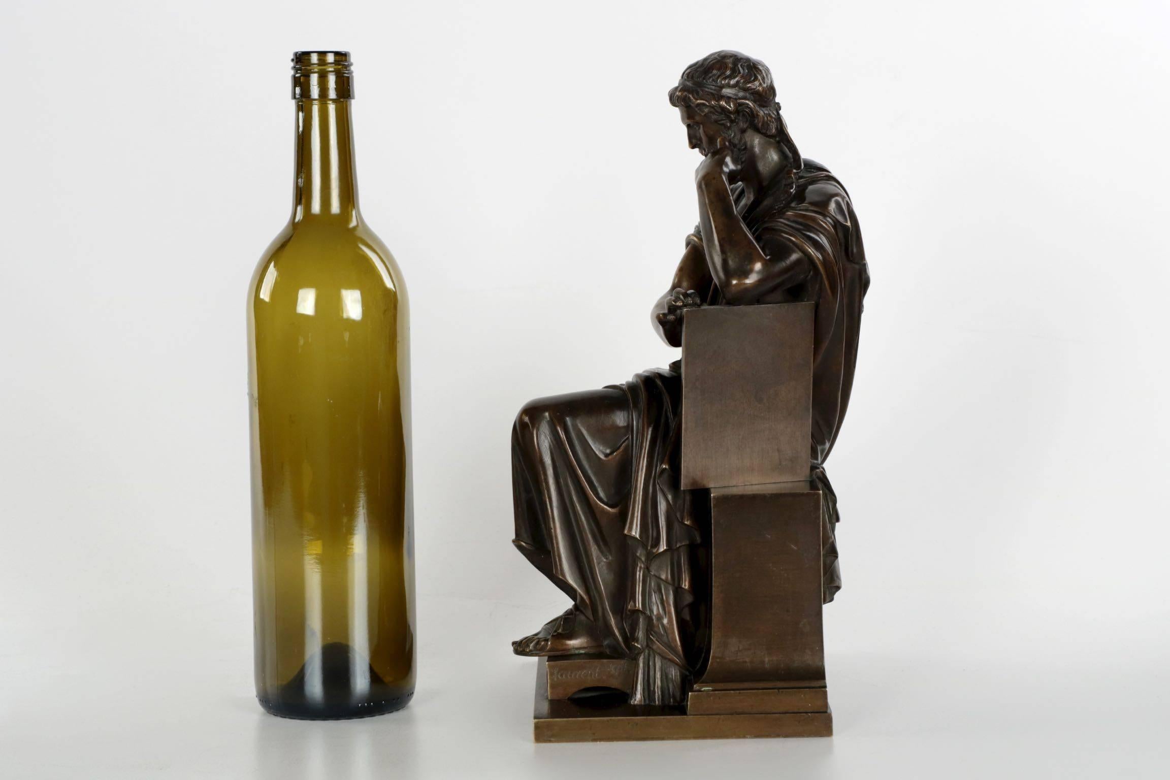 Exquisitely chiselled and detailed throughout, this fine cabinet bronze depicts philosopher Zeno of Elea, famous for his nine paradoxes. The figure is seated with robes flowing over a classical throne while his face is pensive and lost in thought. A