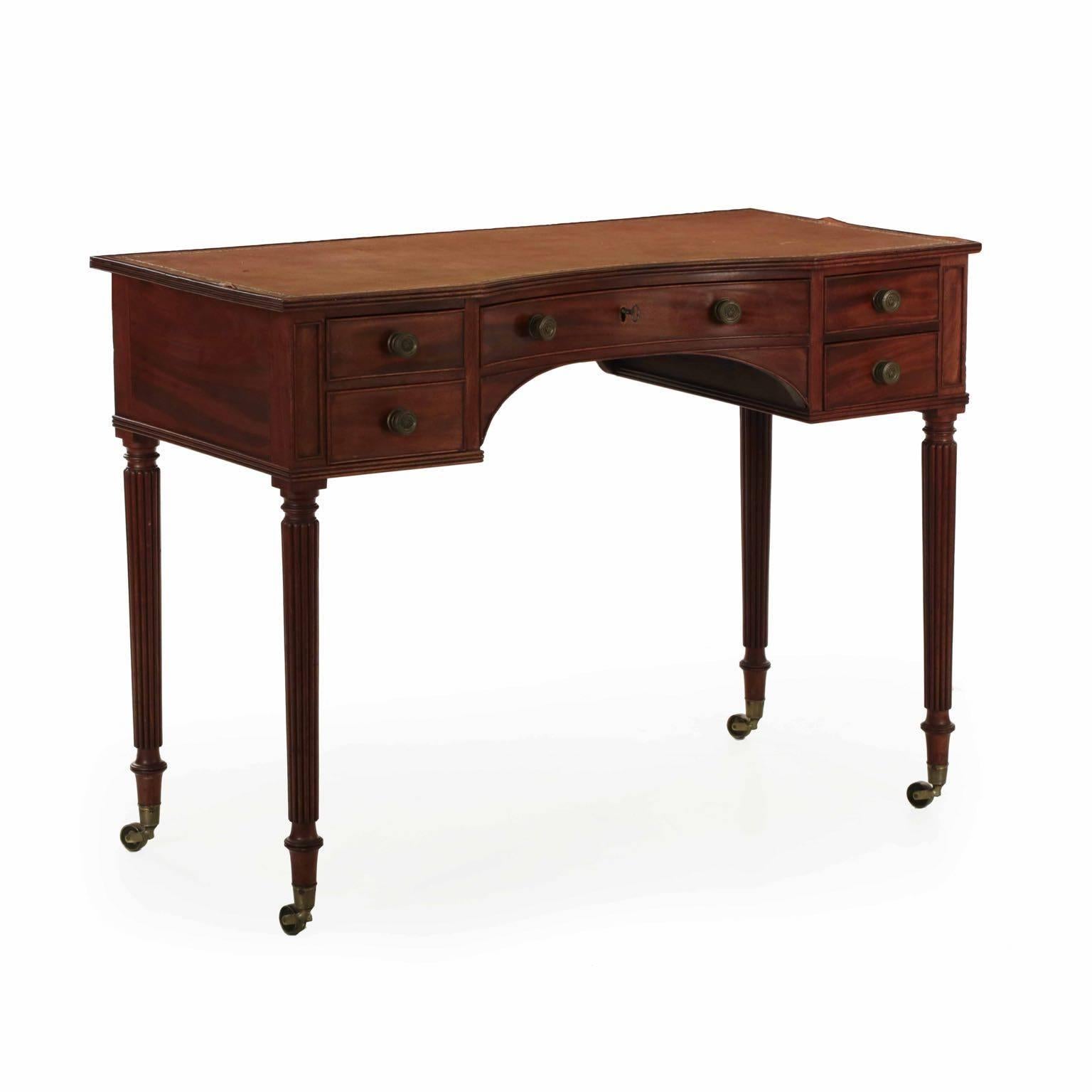 A very finely crafted writing table exemplifies the “neat and tidy” approach craftsmen brought to their work in England during the period. Everything about the case is well planned out and executed: in the drawers, each hand cut dovetails is