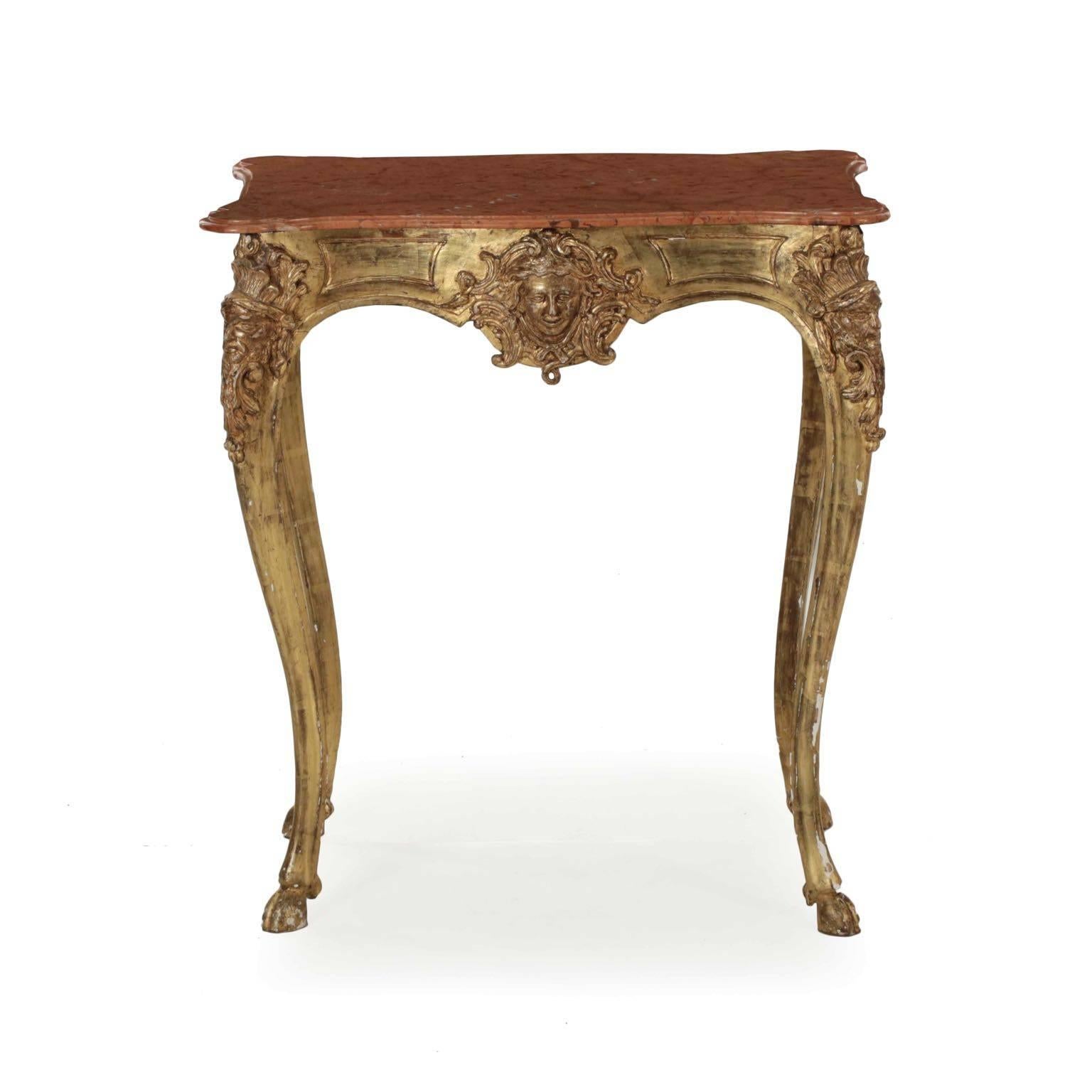 A whimsical piece full of movement and flowing curves, this superb little table has the feel and character of Italian Rococo, though it is a difficult form on which to narrow down origin. Crafted around the middle of the 19th century, the table is