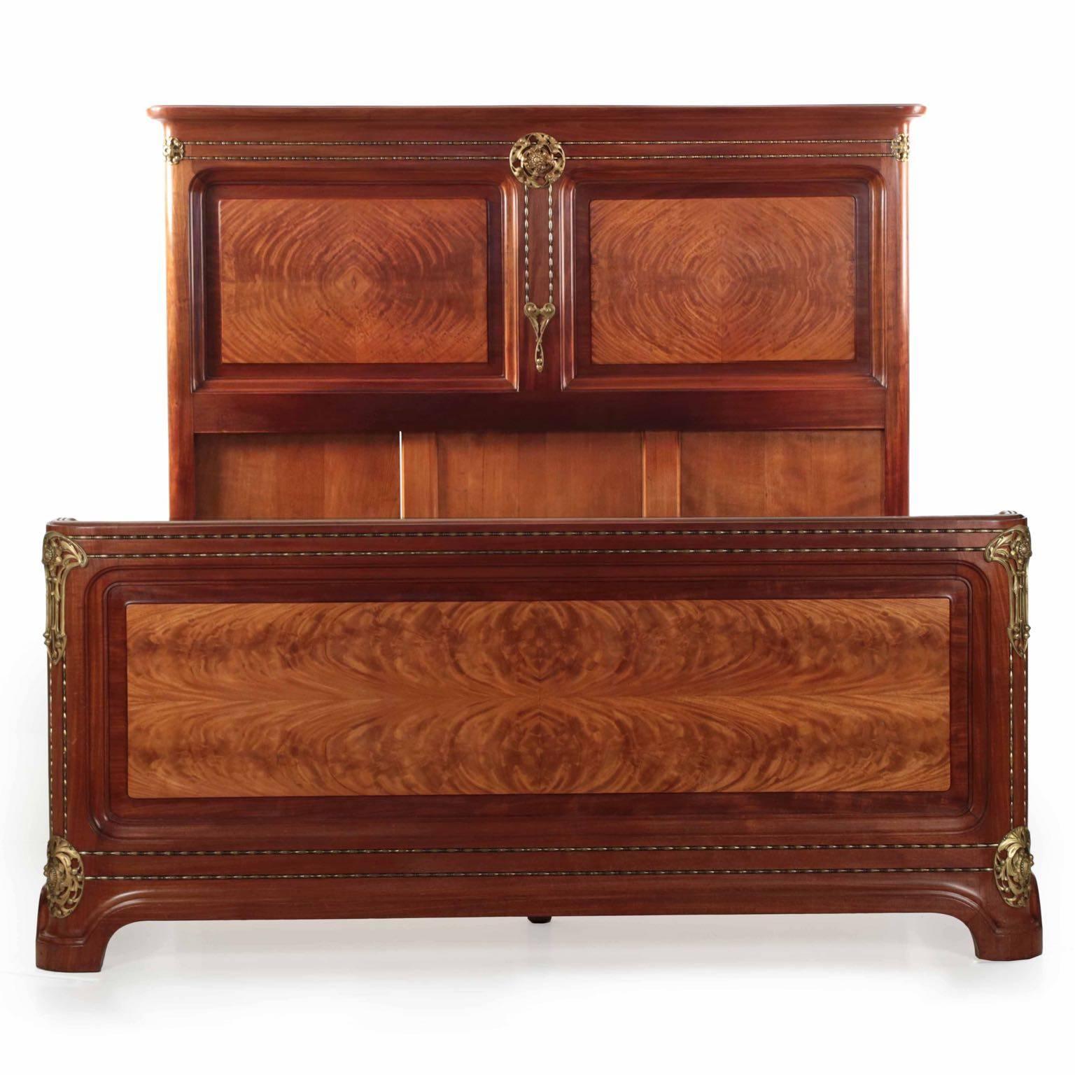 This incredibly fine work of art is from the Pirouette collection by Louis Majorelle; it is unsigned, but we acquired it along with the matching dresser and mirror, both of which are identical to the bed and signed by Majorelle. The suite is