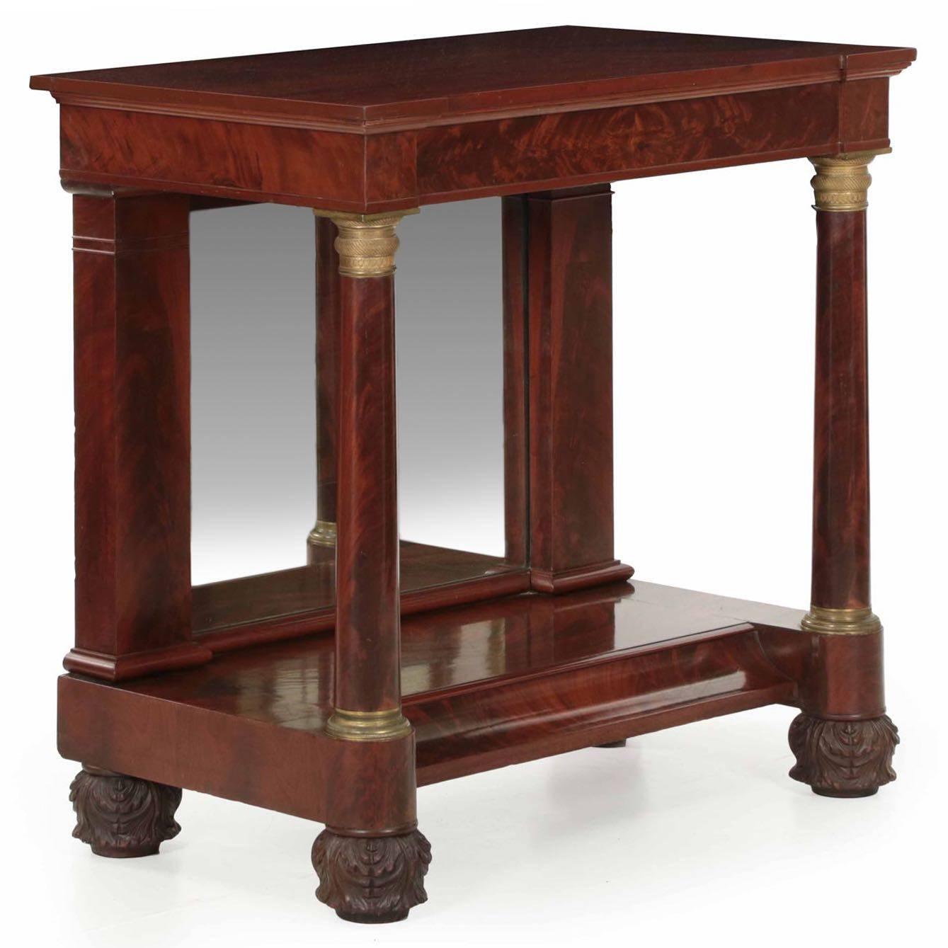 Using excellent selections of matched grain mahogany veneers in the apron and stretcher, the craftsman that reconstructed this piece was quite effective at lightening what is generally a heavy form. The pier table is crafted of period elements,