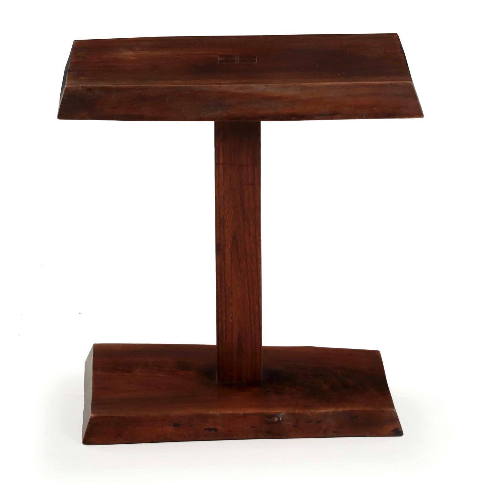 A striking modernism piece from the 1970s by notable woodworker Alan Rockwell of New Hope, Pennsylvania, the table is signed by chisel to the underside in a rough blocked script. A contemporary of Phillip Lloyd Powell and George Nakashima with a