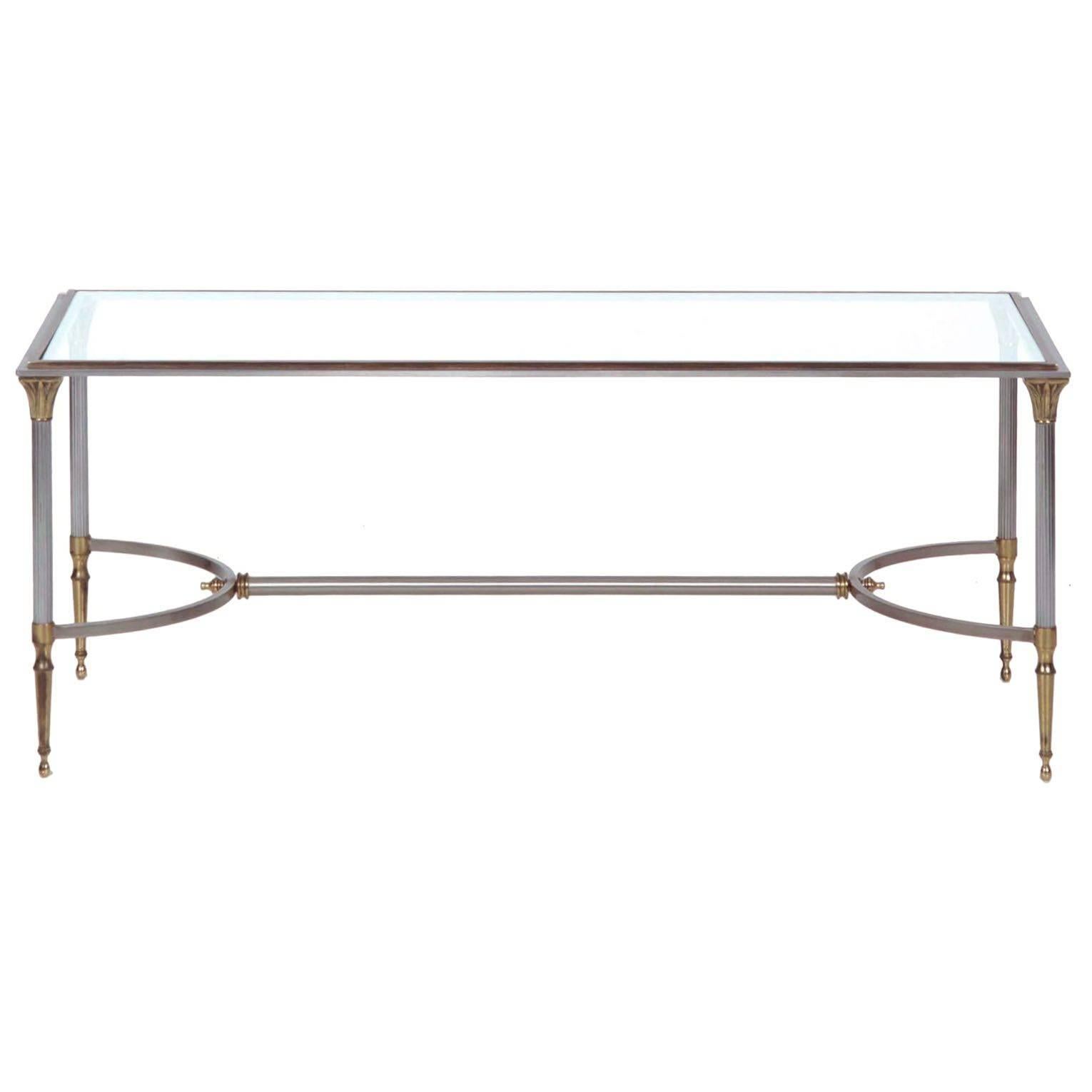A piece of the highest quality throughout, this fine low table is designed in the neoclassical taste using elements that at their time were on the cutting edge. Utilizing cast steel, solid flat bar and reeded tubing, the atelier flawlessly melds a