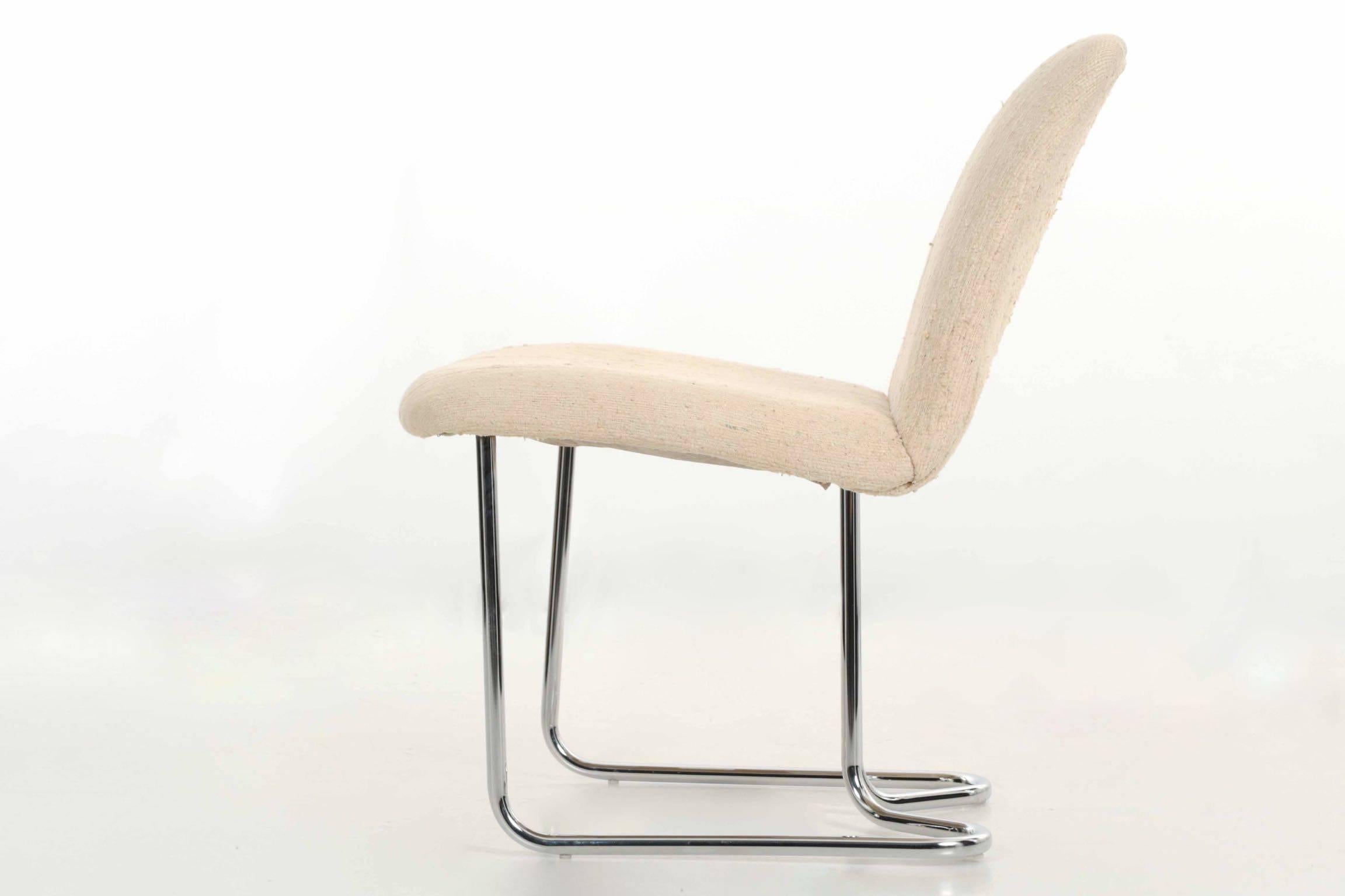 A great vintage set of four dining chairs manufactured by Design Institute America, in the 1970s, they retain their original upholstery and a high quality chromed surface. The tubular steel remains in excellent condition with only minor pitting. An