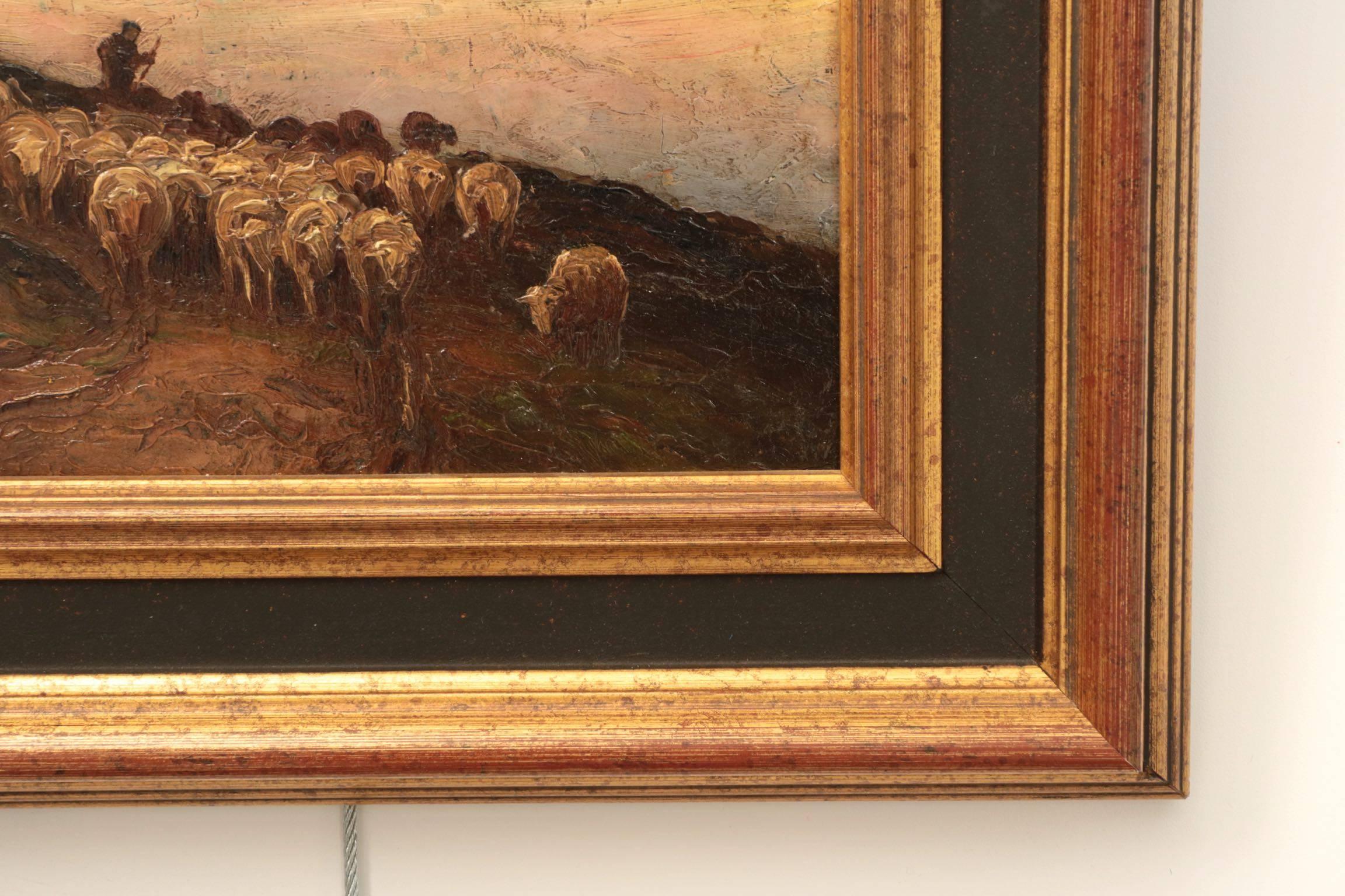 A fine Barbizon work by the American artist Francis Wheaton, this oil on panel depicts an evening scene of a shepherd bringing his flock home after a day at pasture. The complex sky is warm and chaotic with hints of pink over the horizon blending