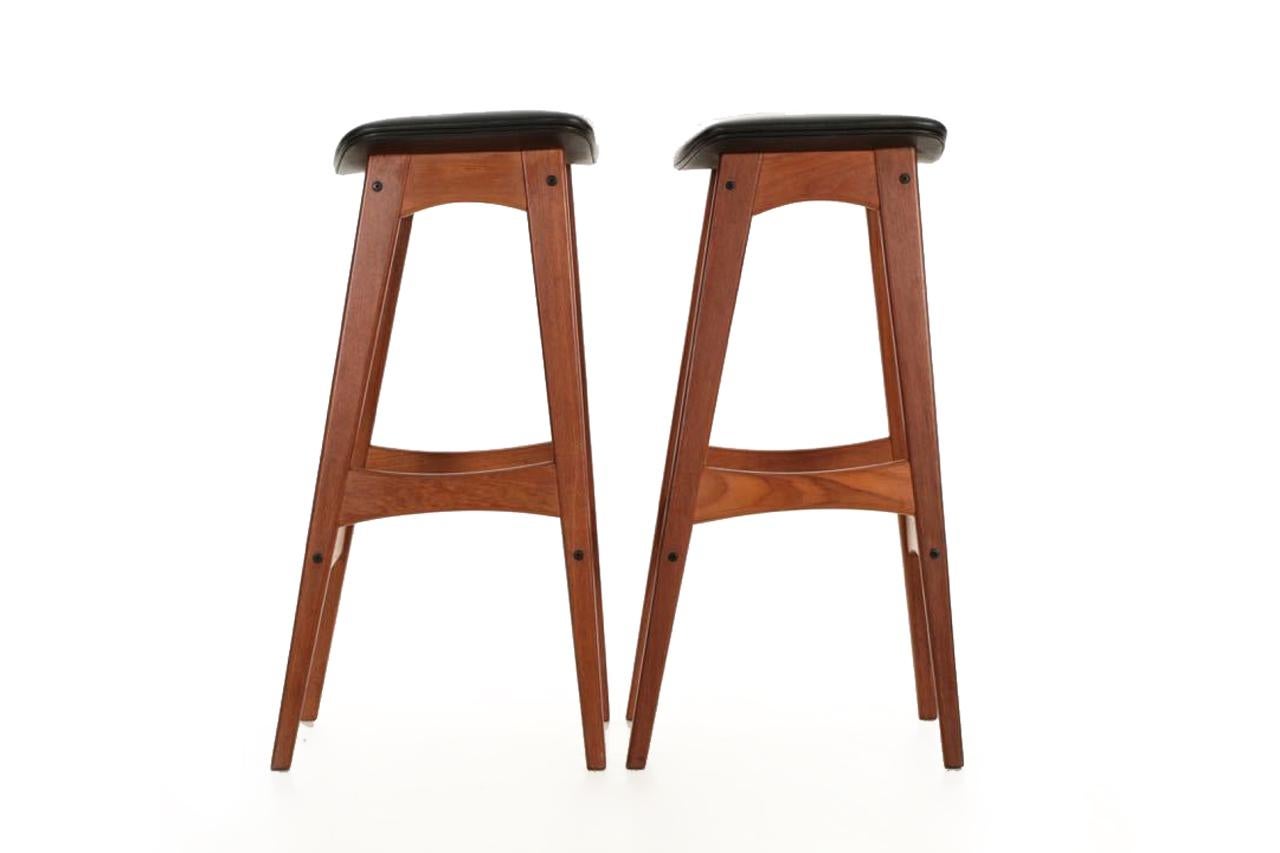 Pair of Danish midcentury sculpted teak barstools
By Johannes Andersen for BRDR Andersen Vejen, circa 1961
Item # 709NYZ15P

Designed by Johannes Andersen in 1961, the clean and undistracted molded teak looks nearly brand new from careful use