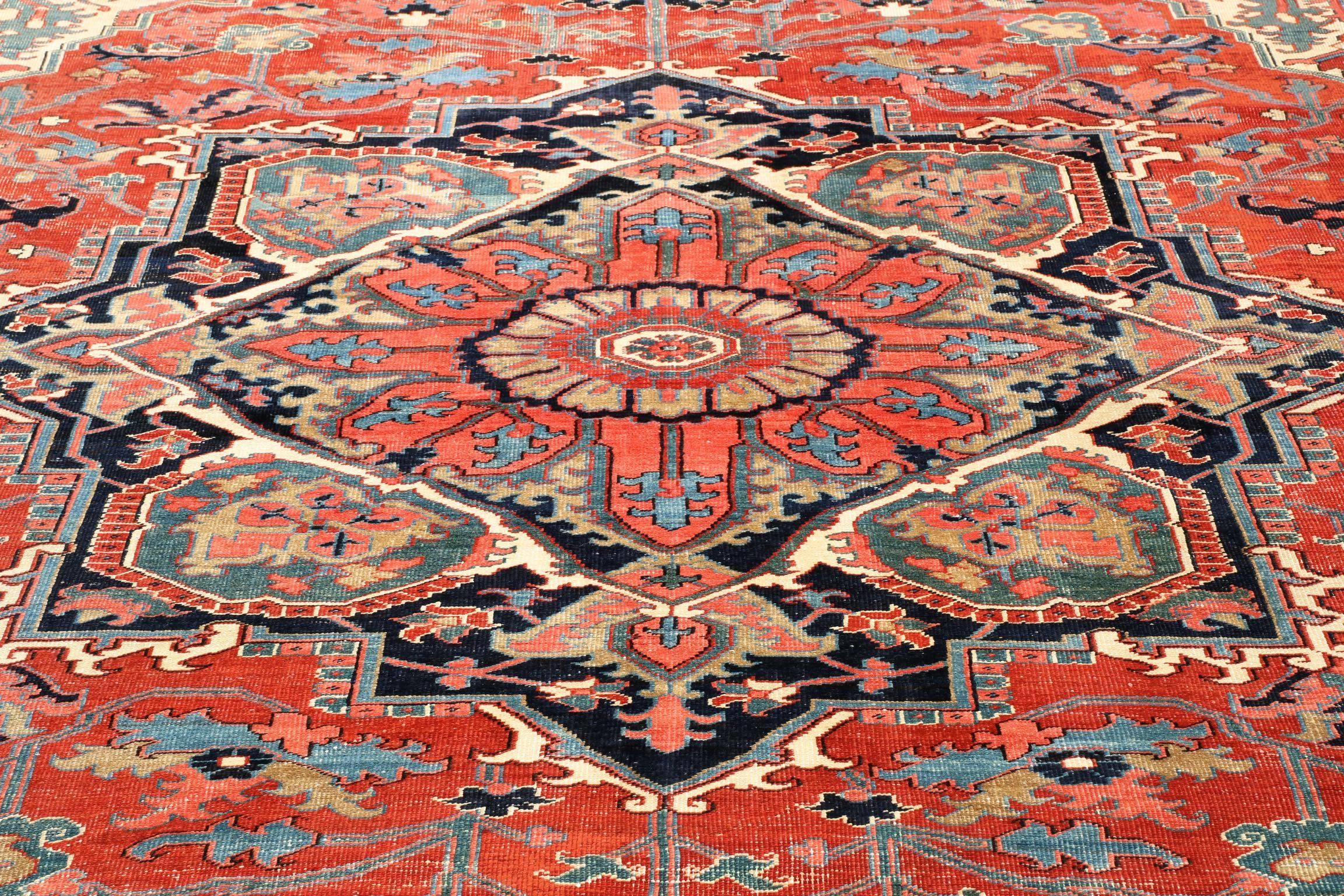 An absolutely stunning and quite large room size Persian Heriz, this very fine carpet was woven during the first years of the 20th Century and exhibits the sturdy and rugged knotting that has allowed the rug to survive in overall excellent condition