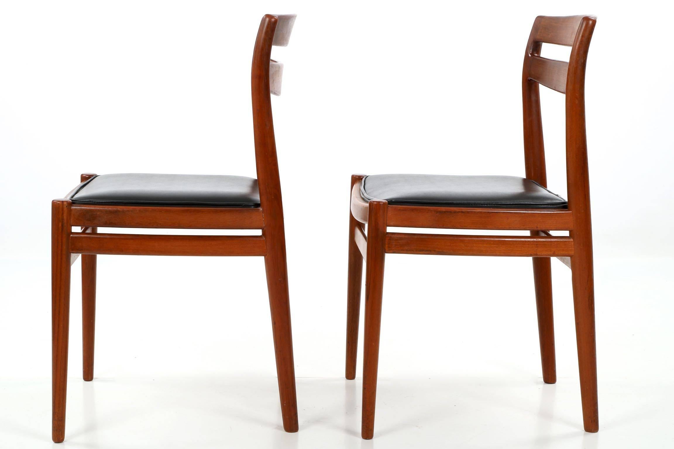 Four Danish Mid-Century Modern Teakwood Side Chairs, Retailed by Leo Spivak Inc. 1
