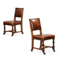 English Pair of Carved Leather Antique Side Chairs, Early 20th Century