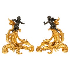 19th Century Pair Louis XV Style Bronze Fireplace Chenets with Putto Sculpture