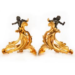 19th Century Pair Louis XV Style Bronze Fireplace Chenets with Putto Sculpture