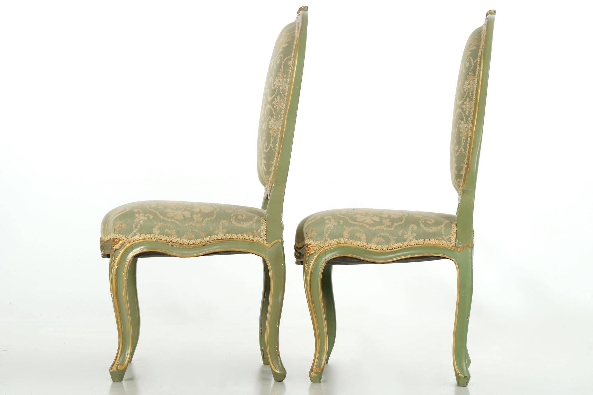 An excellent pair of mid-late 19th century side chairs in the Louis XV taste, they are crafted with precision using tenon-mortise joints locked together with pins that are just barely visible under the surface with hairline cracking where the pin