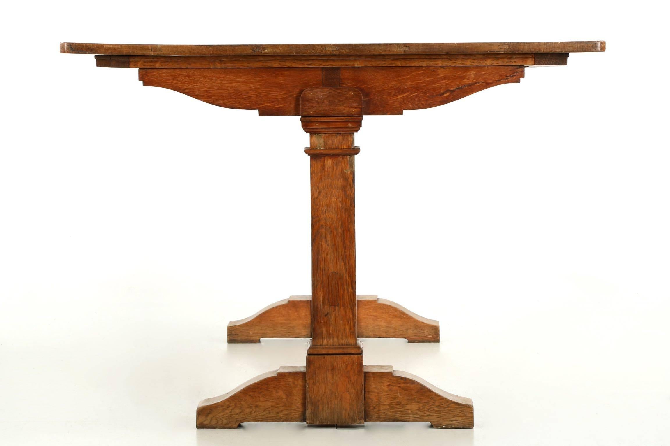 This wonderfully worn oak breakfast table is a clear product of the Arts & Crafts movement of the late 19th and early 20th century, probably being of English origin.  The faded patina in the original surface is most attractive, the finish having