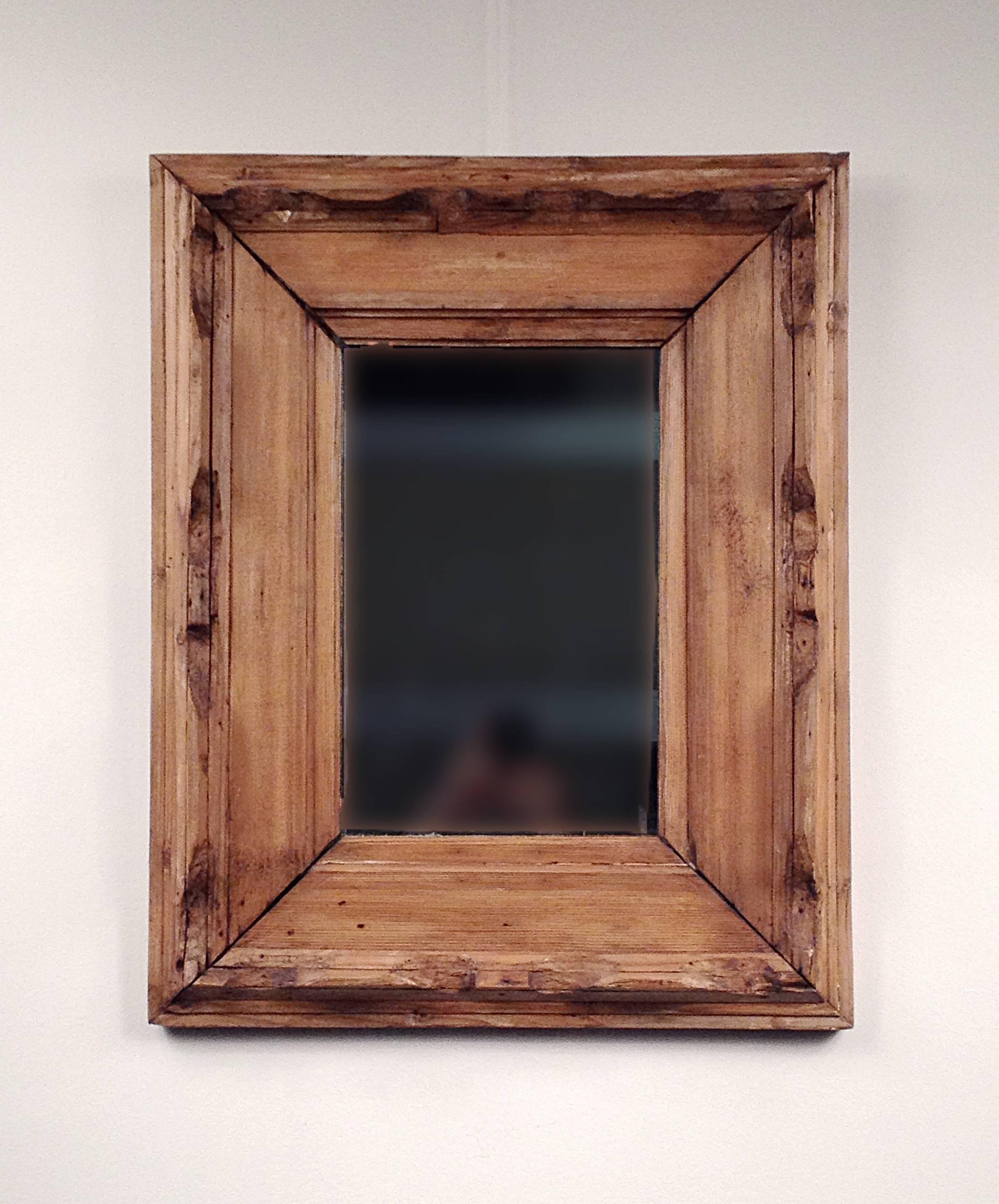 Rare carved mirror from Sag Harbor NY. Original plate, beautifully oxidized,
late 18th century.

