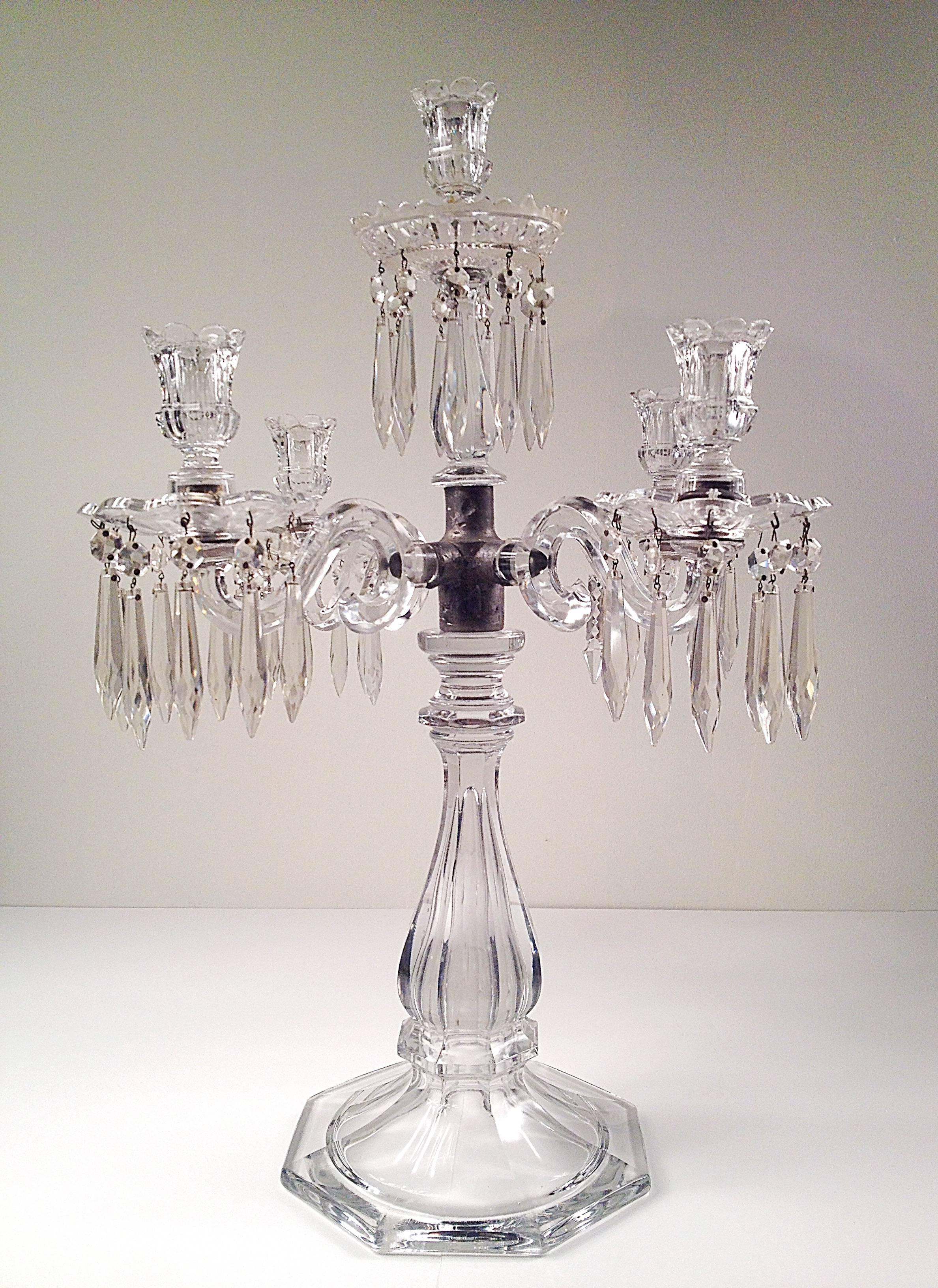 19th century cut-glass candelabra, with five lights and central obelisk, dressed with crystal glass drops.