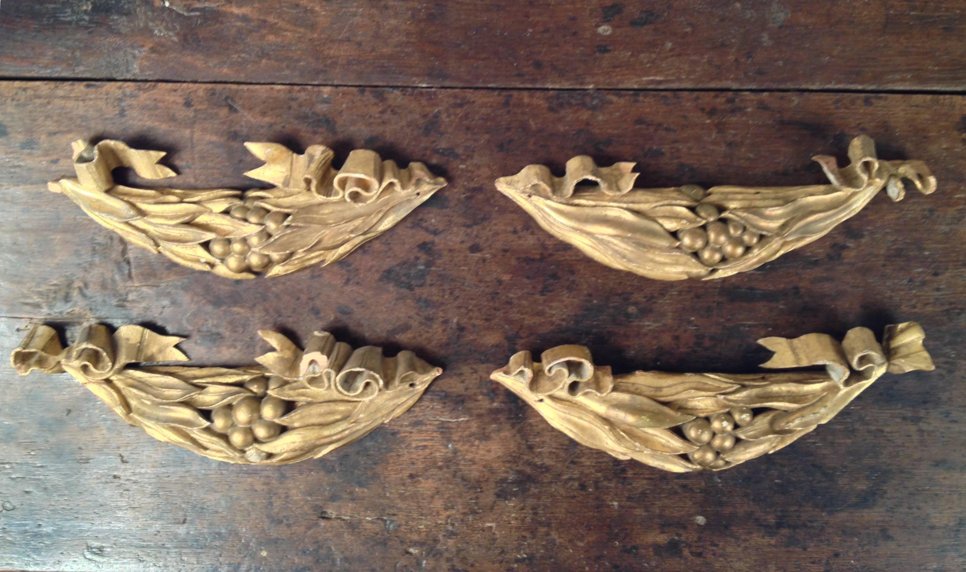 Collection of four beautiful and detailed gilded wood carvings, France, circa 1800.
Original finish and wonderful patina.