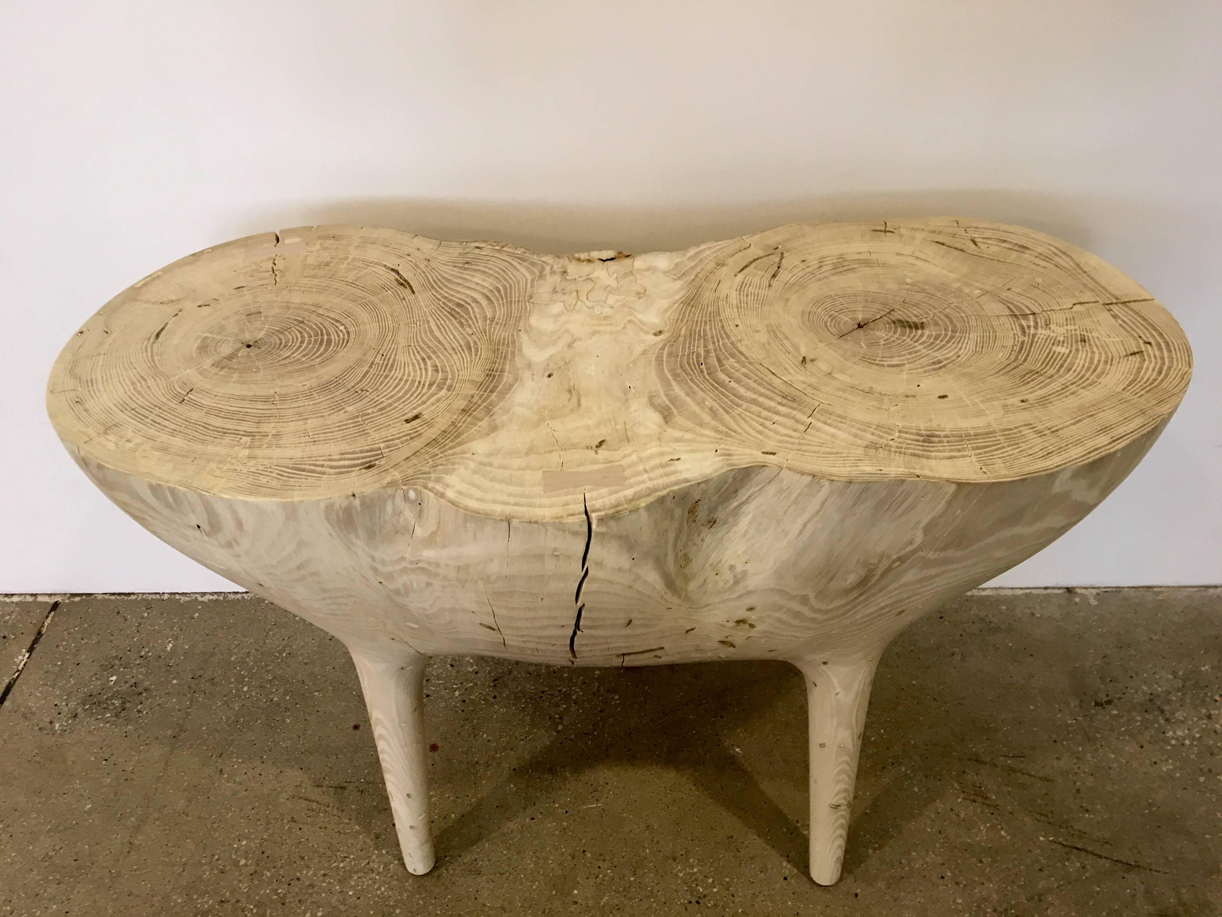 Unique hand-carved side table by Caleb Woodard, made of bleached ash.
Organic form supported by three long legs.
Great presence and style.