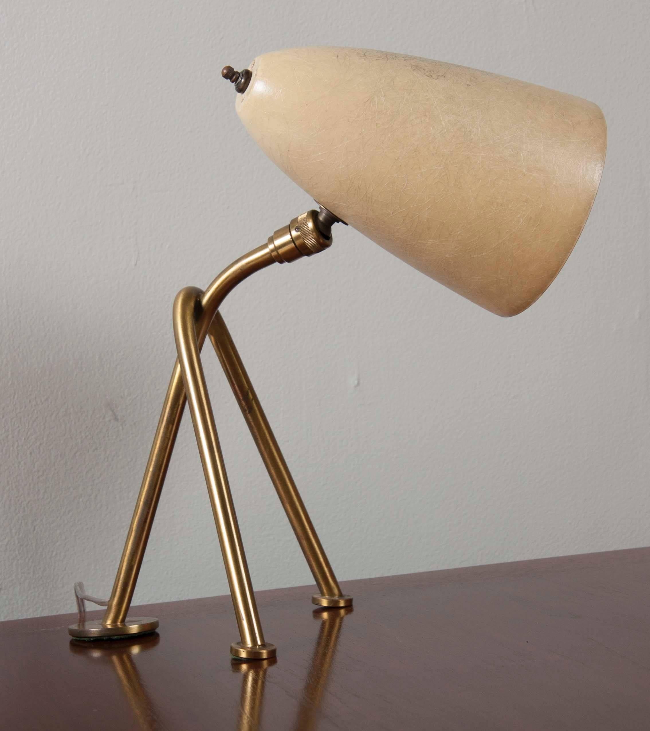 Beautiful, all original Greta Grossman desk lamp with cream shade. Newly rewired. Slight discoloration on top of shade, but not at ll noticeable when lit.
Warm brass patina and original switch.