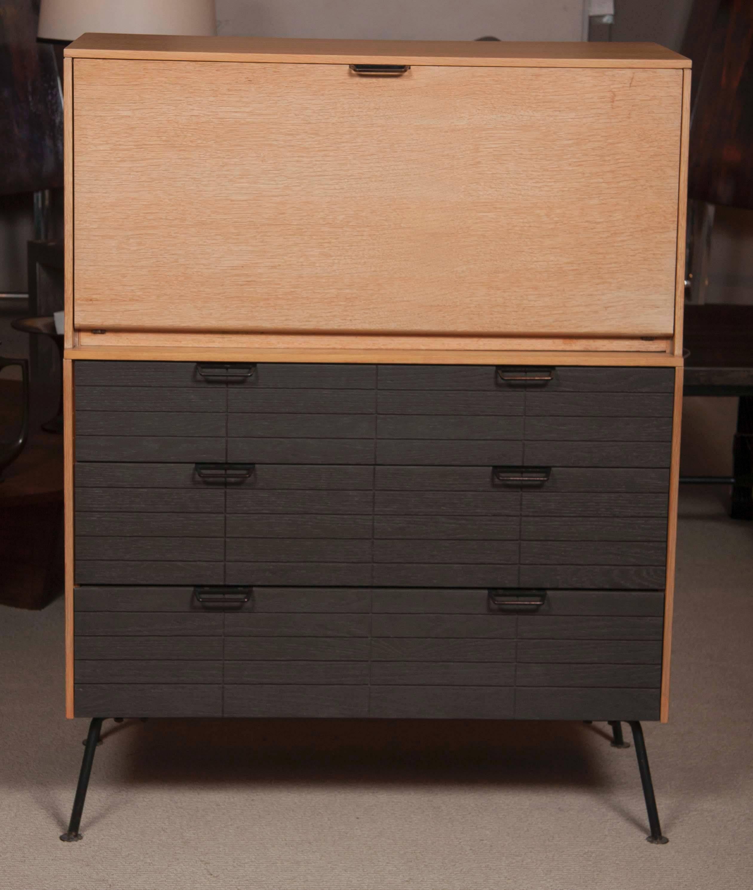 Beautiful design by French born - Raymond Lowey droptop desk with cerused outer box and drawers and original robin blue interiors. Ample storage space.
Black iron legs and handles. Perfectly restored, great look and character.