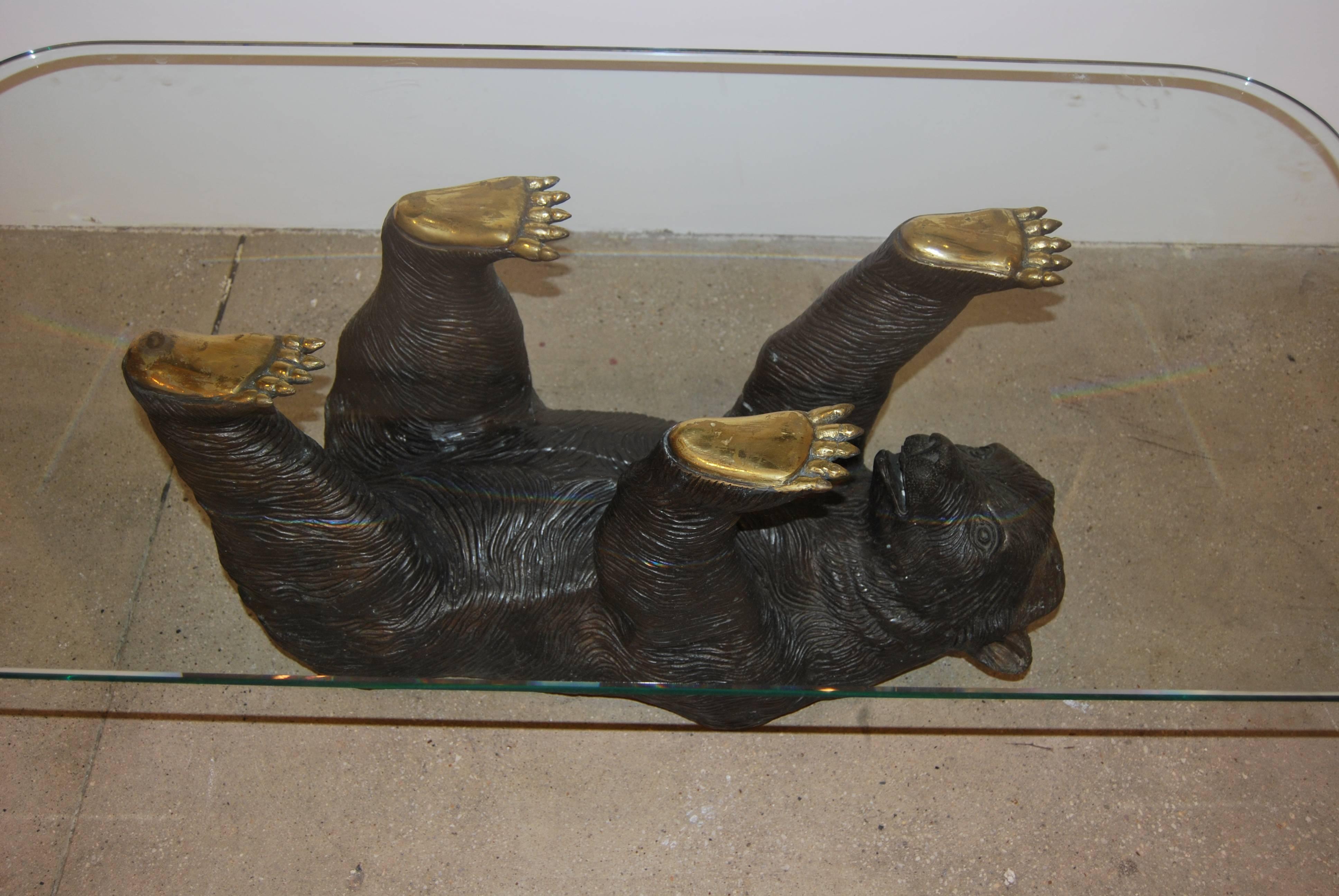 Rare cast bronze, bear shaped coffee table, France, 1970s.
Measures: 1/4" thick glass top.
Great presence!