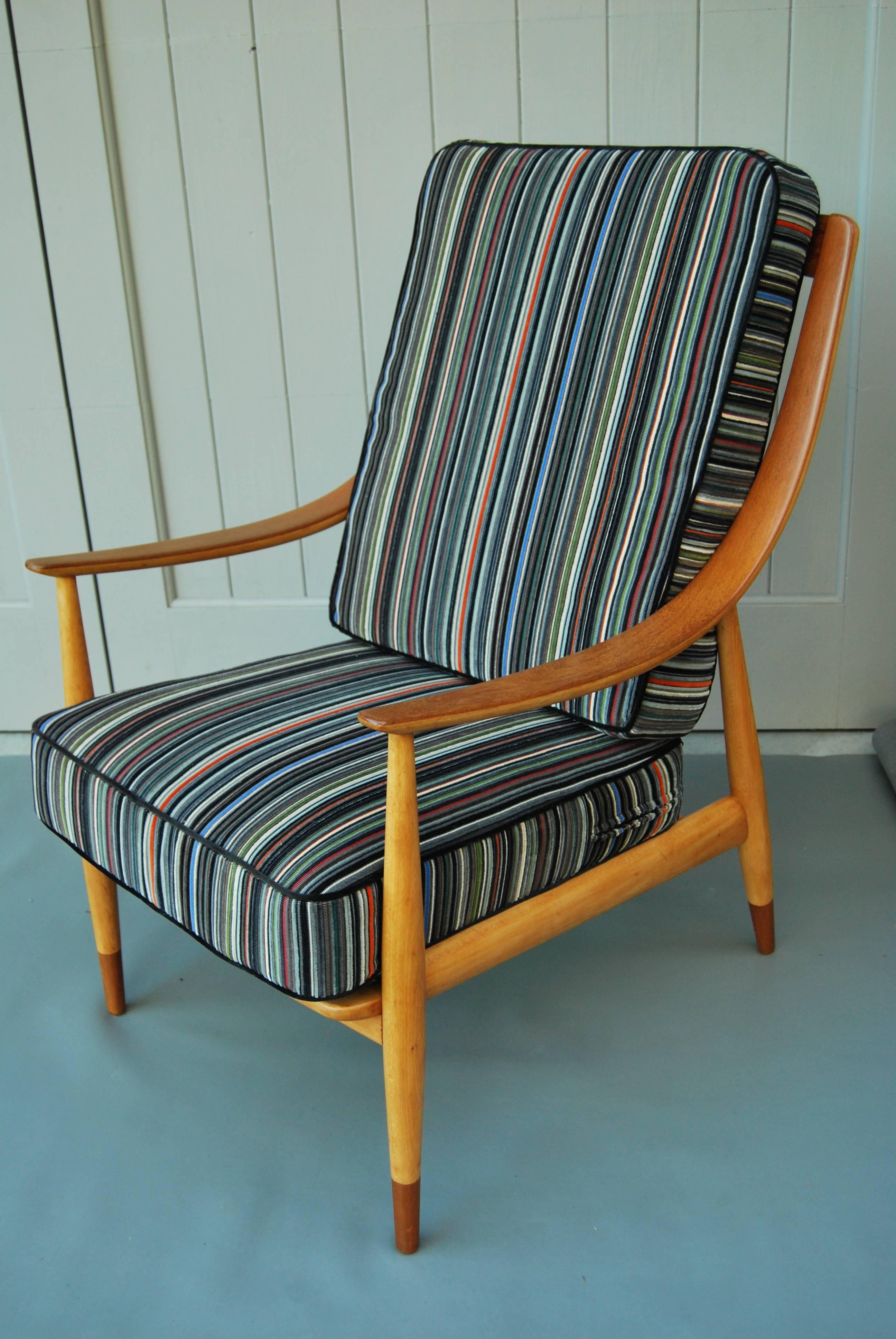 Newly refinished and reupholstered, great scale Peter Hvidt easy teak chair, produced by France & Son, 1960s.
Frame has been refinished in its original, natural color and spring cushions have been reupholstered in Maharam striped velvet.
Great