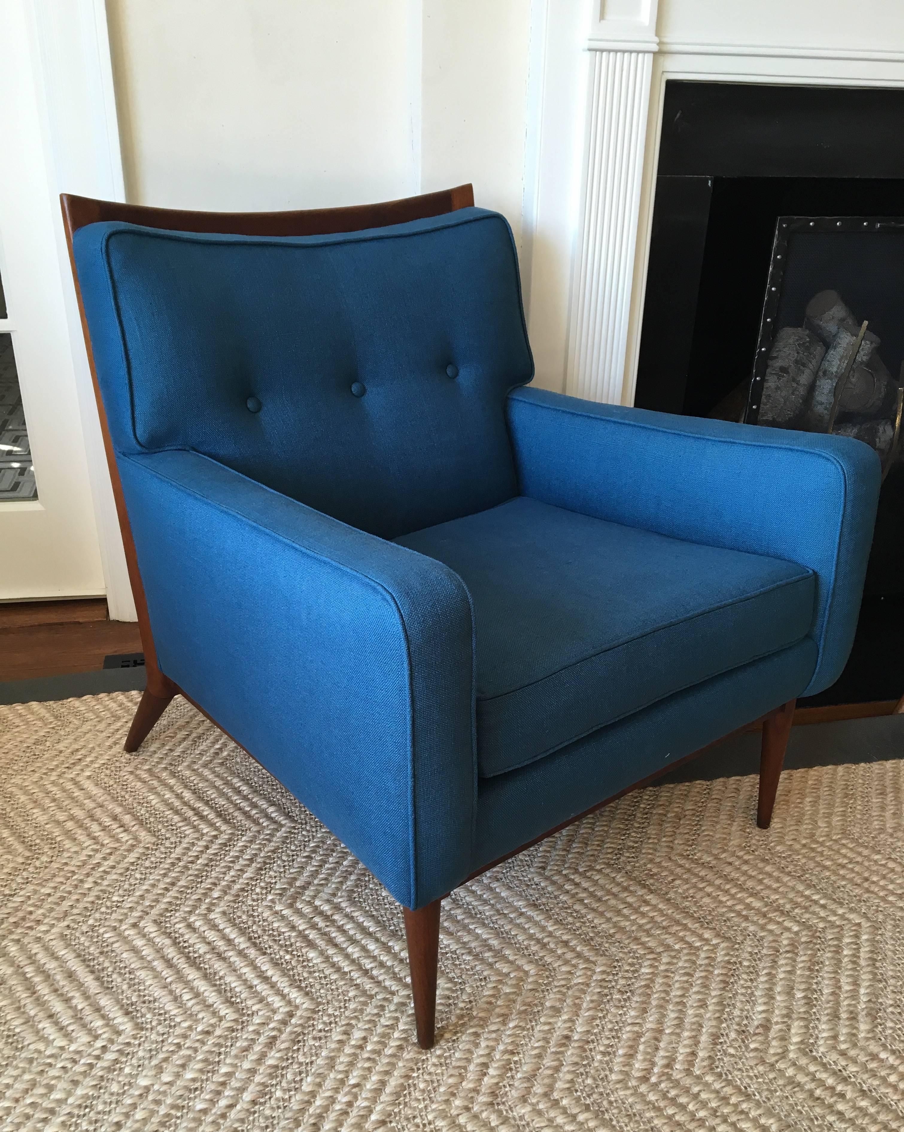 Iconic, single walnut chair, designed by Paul McCobb and produced by Calvin - 1950s. 
Walnut frame is beautifully refinished in natural and complemented by a peacock blue linen upholstery.
Please inquire if you like to see this chair in the gallery.