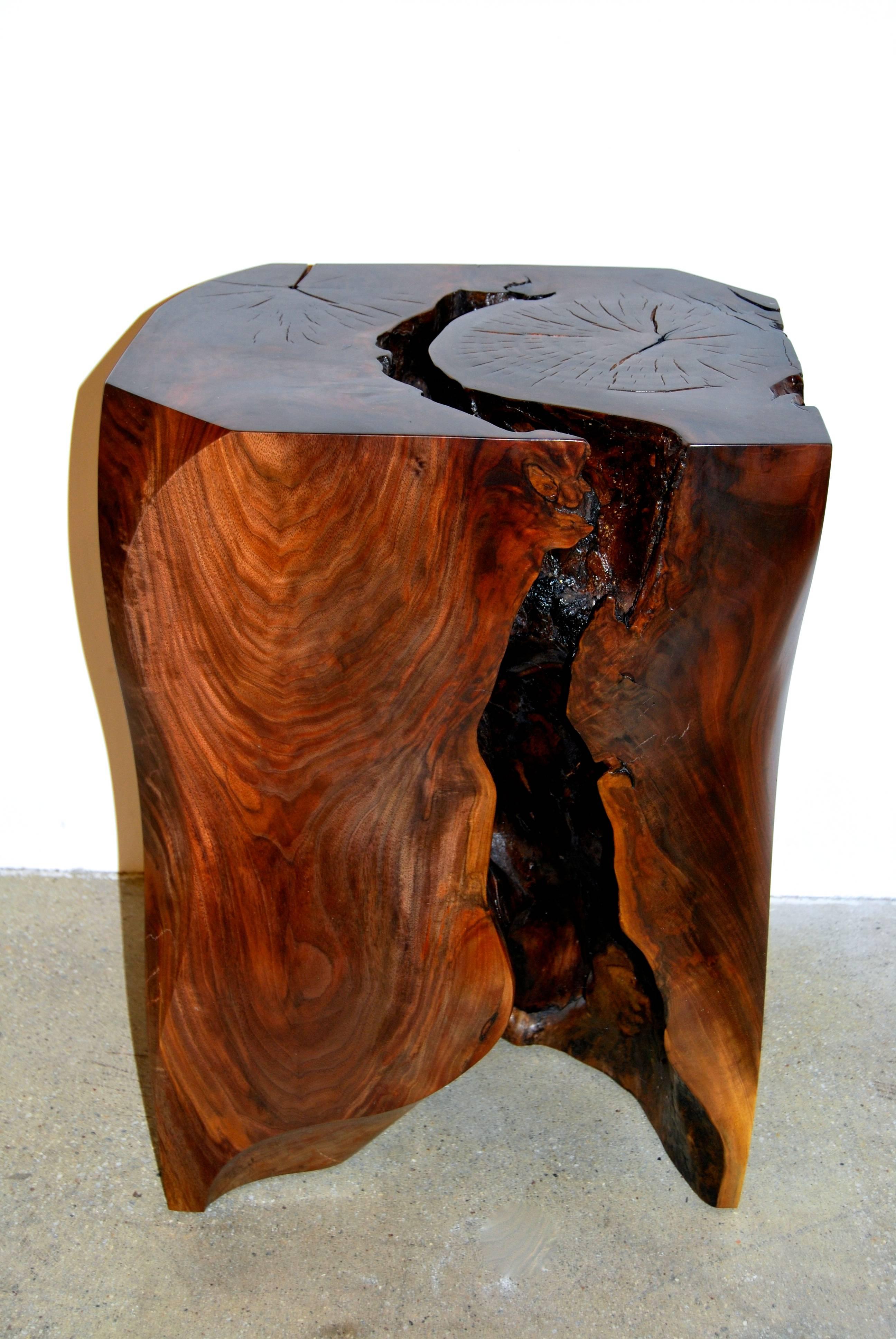 Solid walnut carved side table by artist Caleb Woodard with natural cavity.
Unique piece!
Incredible, sculptural presence.

This piece can be viewed at my gallery at 200 Lex, 10th fl.
Please contact me for further details.
