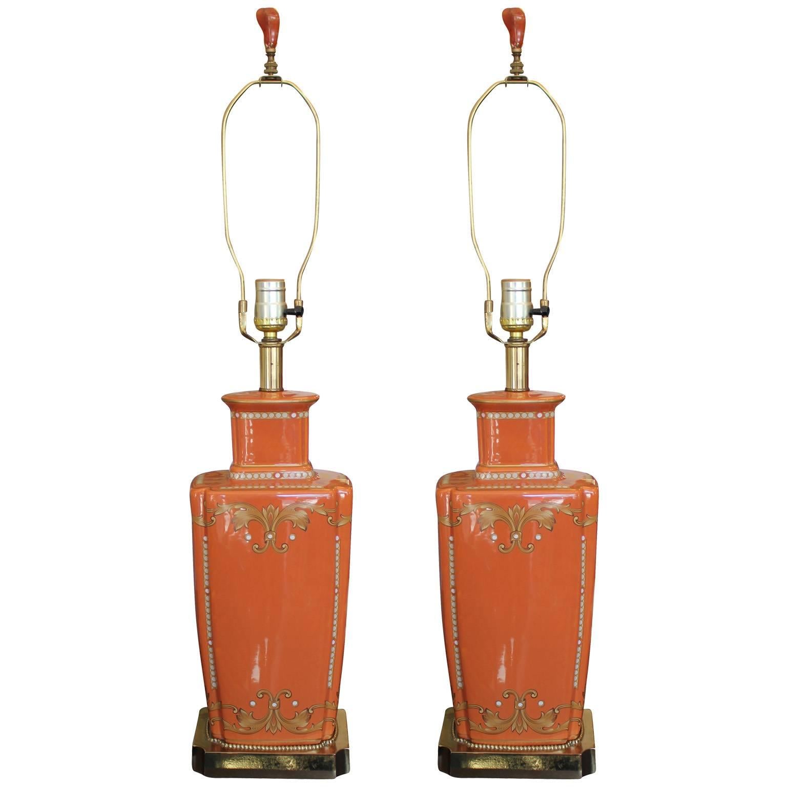 Pair of Vintage Orange Lamps with Shiny Brass and Amber Accents
