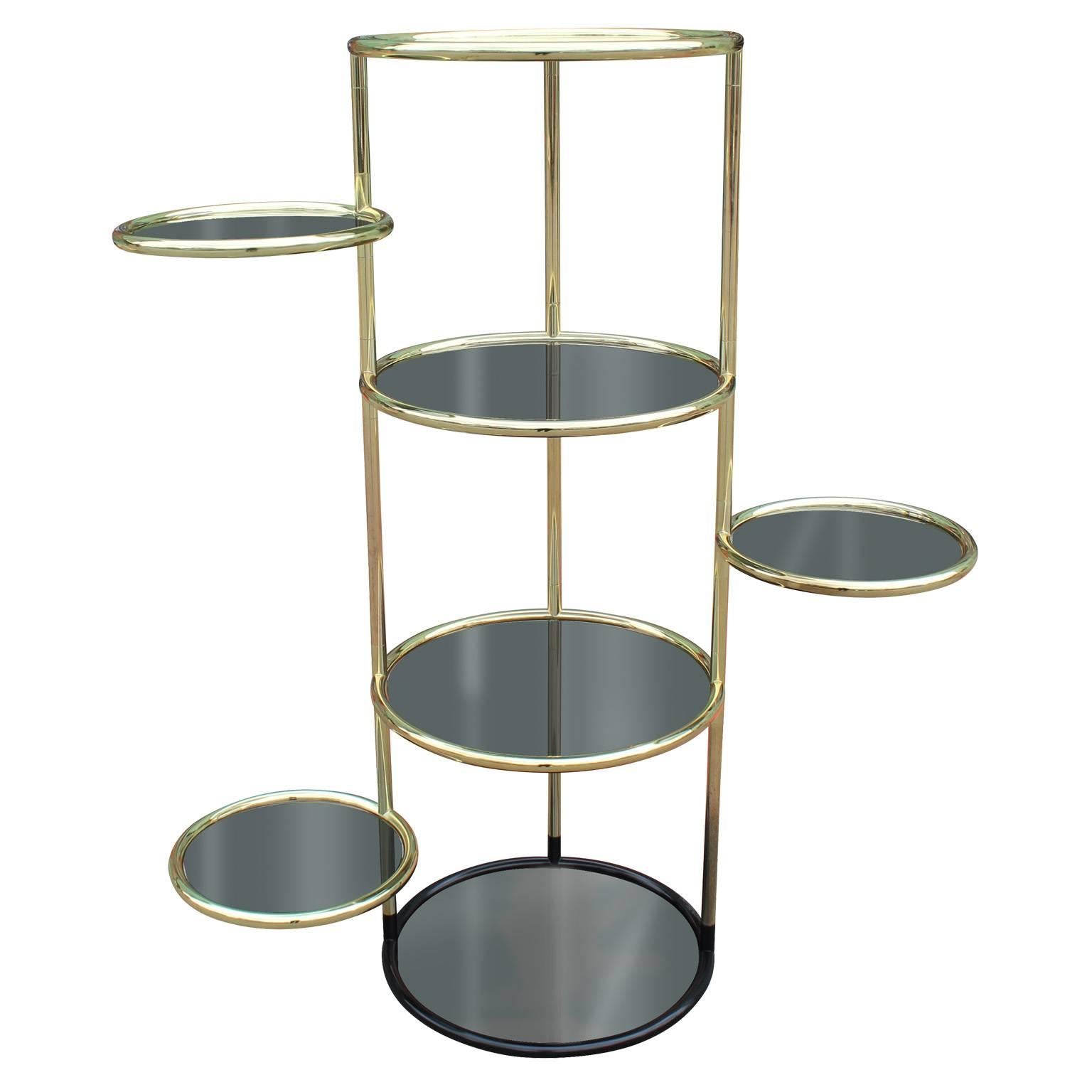 Hollywood Regency Brass and Smoked Glass Swivel Etagere